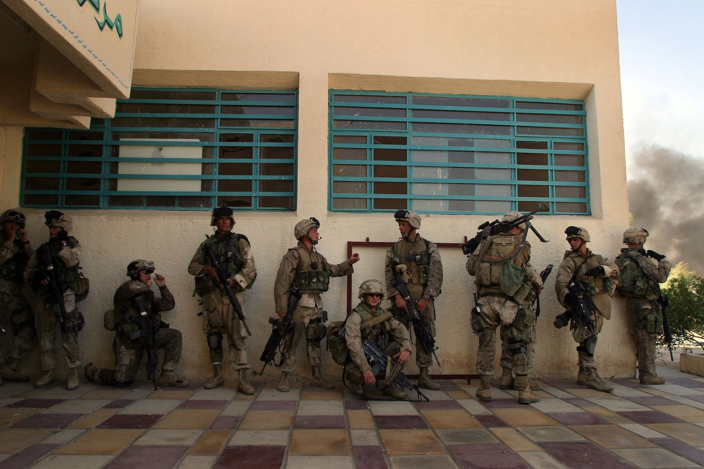 US Marines from Charlie Company 1/4 3rd Platoon rest while on patrol