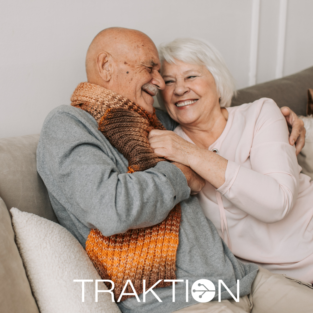 Image of two seniors in their own home.