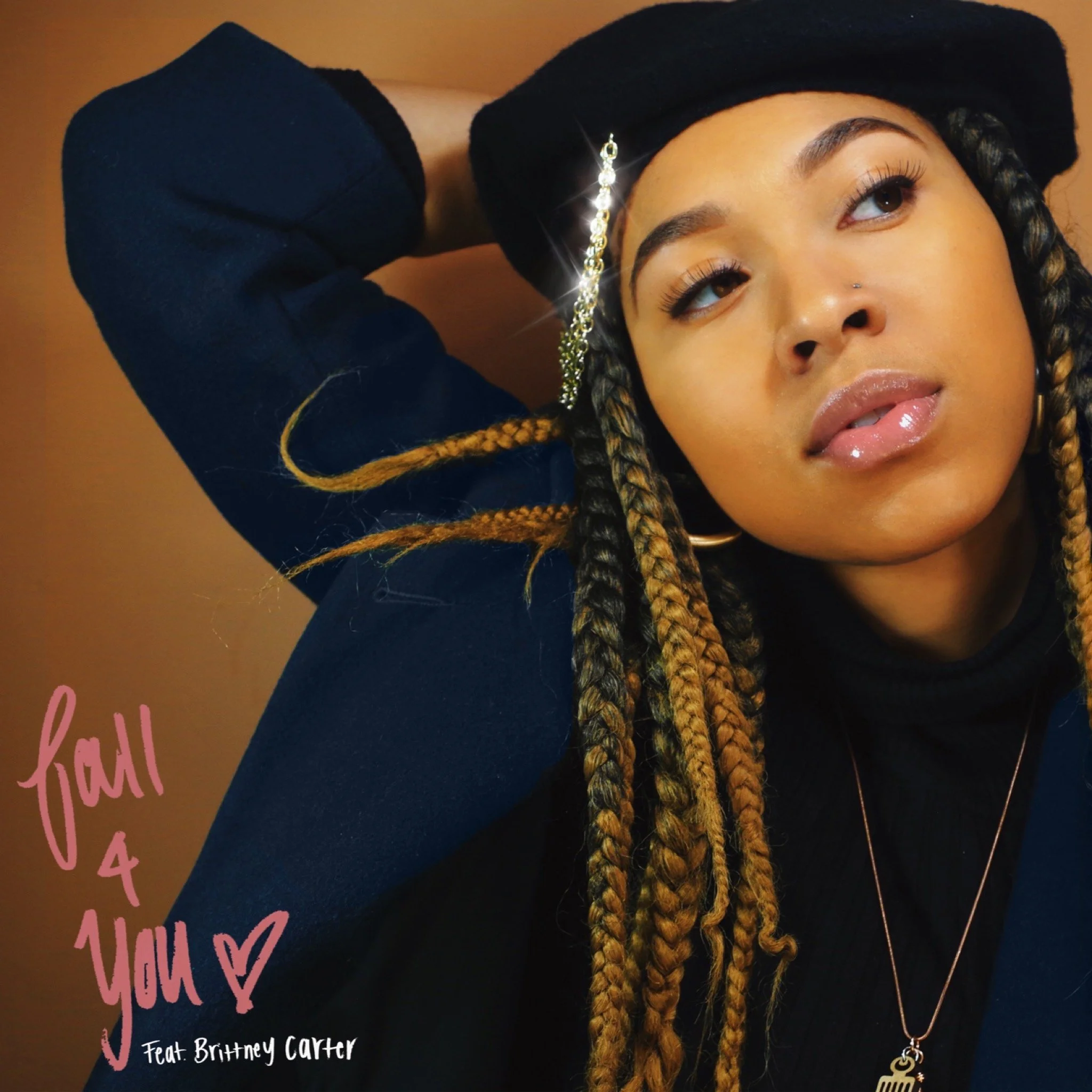Woman with braids and a beret with a gold chain looking to the side. Oliv Blu cover art for single 'Fall 4 You' Featuring Brittney Carter. Brown background.