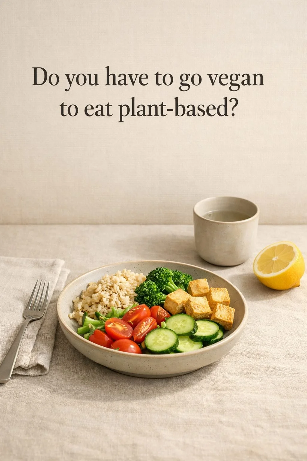 Minimalist plant-based meal with tofu, vegetables, and grains on a neutral ceramic bowl, styled simply to represent flexible plant-based eating without strict vegan rules.