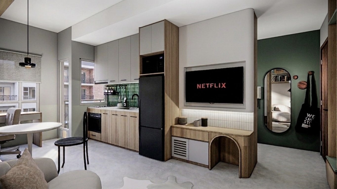 Modern kitchen and living room with a Netflix streaming on the TV, dining area, black refrigerator, green backsplash, and green accent wall with a mirror and hanging bags.
