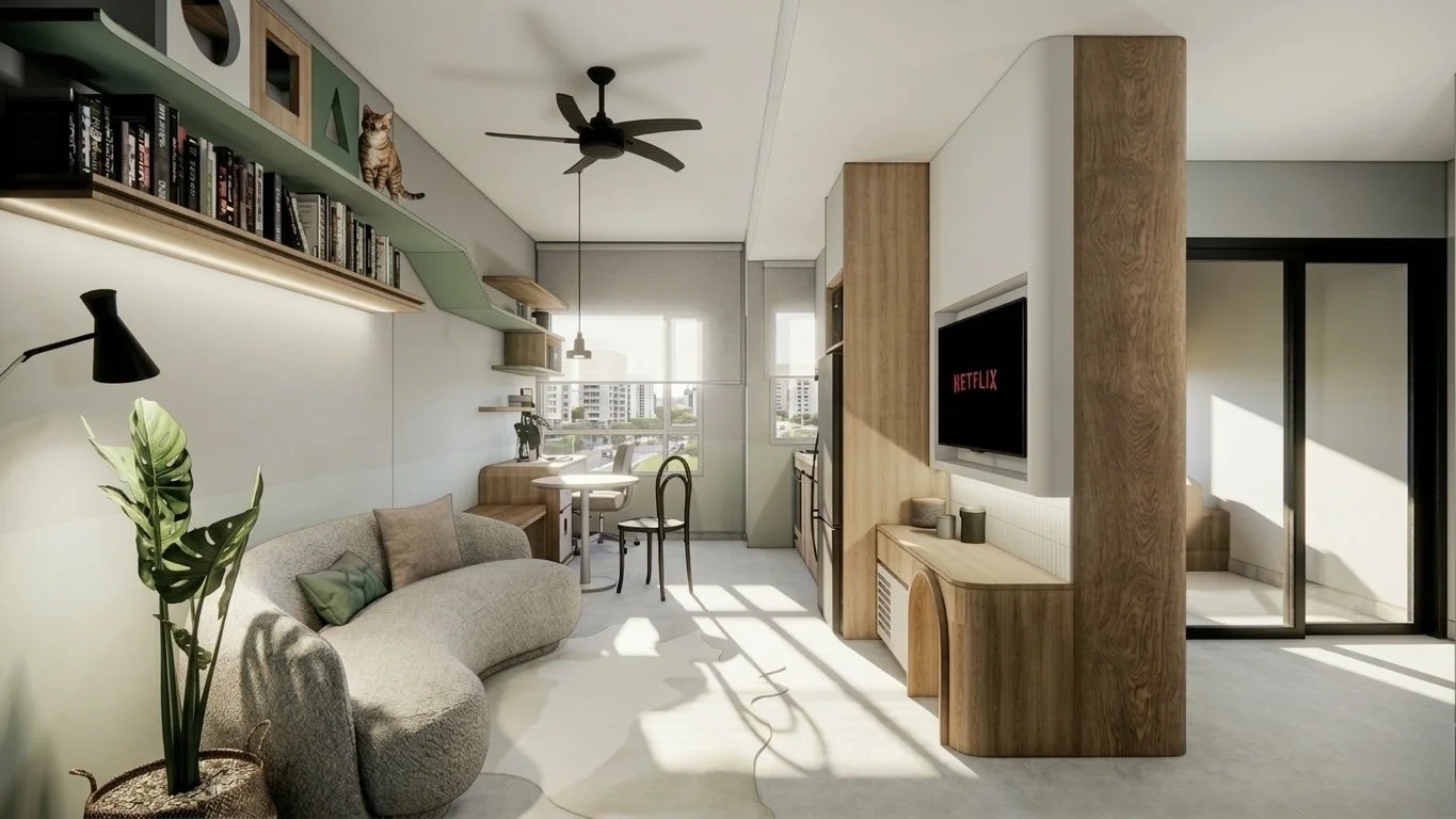 Bright modern living room with a curved beige sofa, a large green plant, wooden and white furniture, a wall-mounted television displaying Netflix, and a balcony with sliding glass doors.