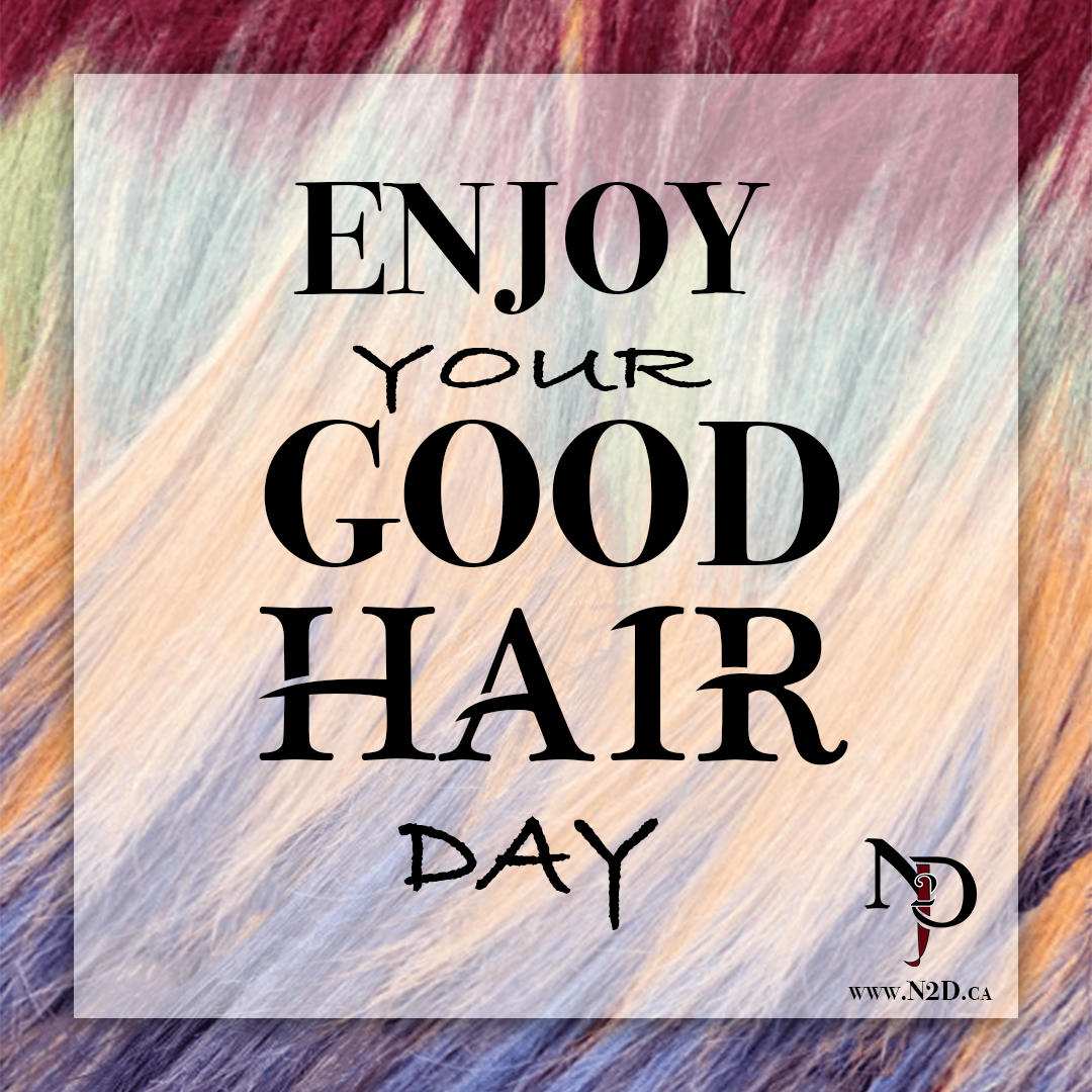 Decorative sign with colorful background and overlaid text that reads, 'Enjoy your good hair day', with a small logo and website link in the bottom right corner.