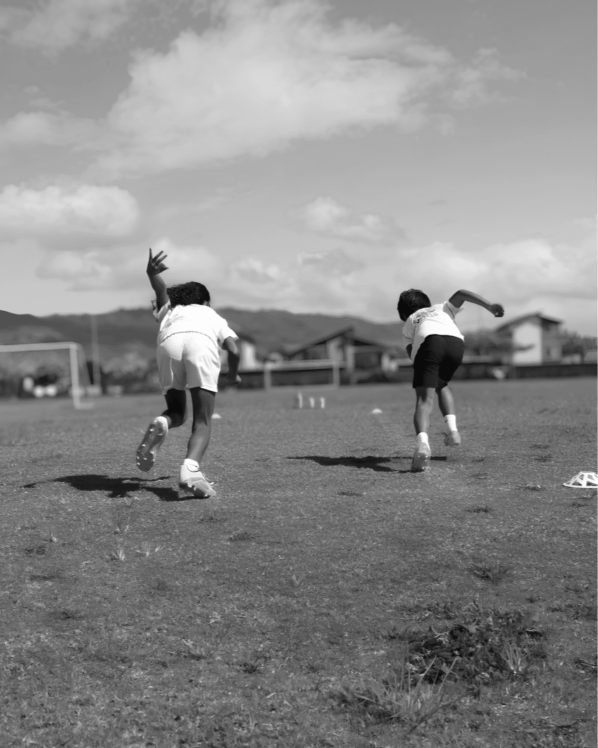 A boy jumping into a squat