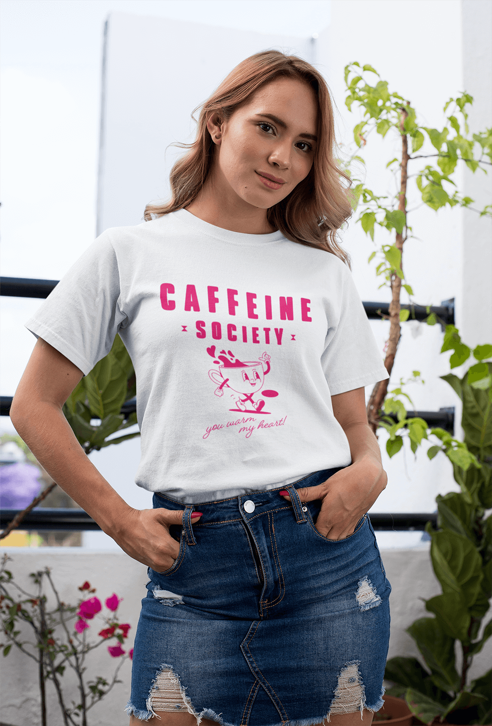 tee-mockup-of-a-girl-with-a-coy-smile-by-a-balcony-26628.png