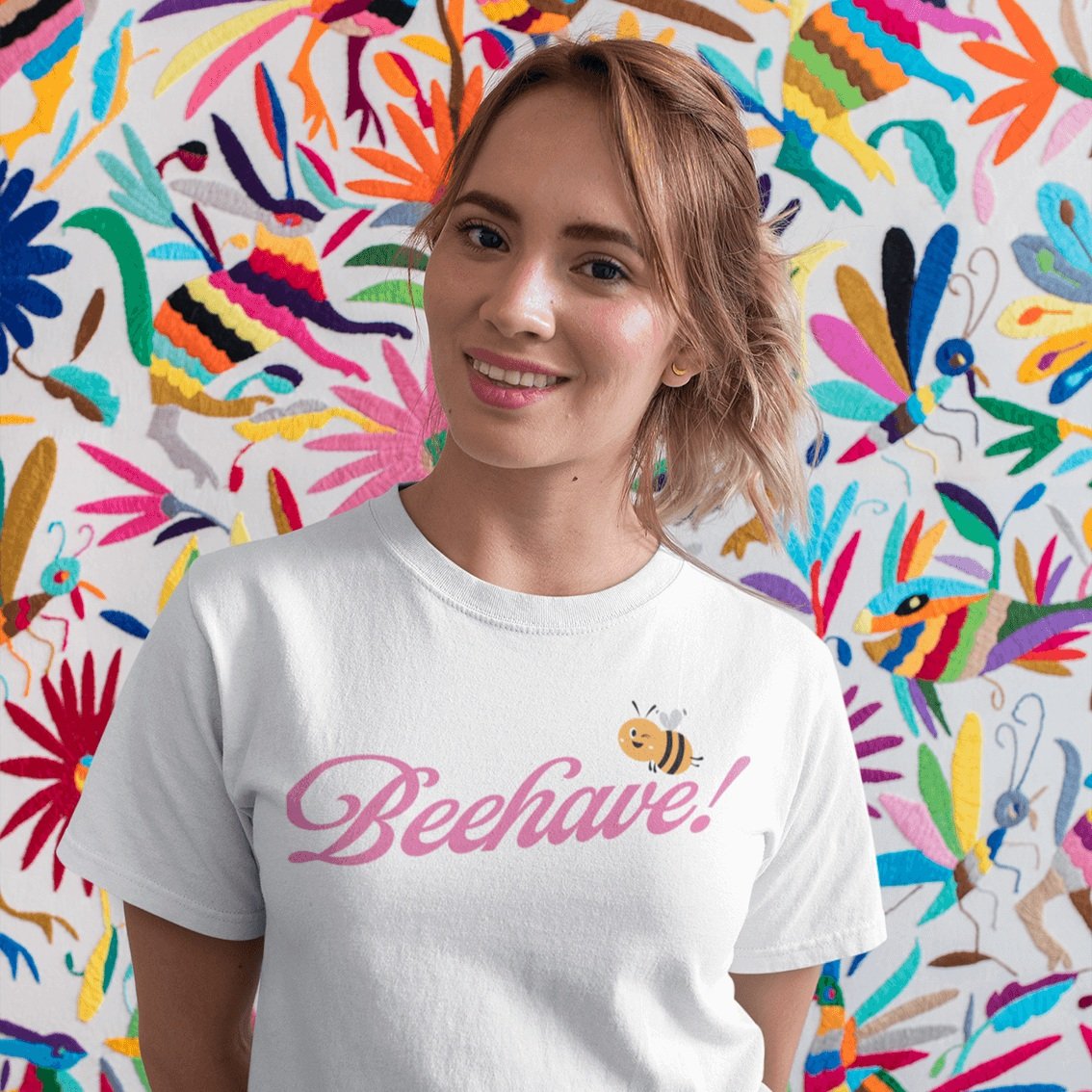 t-shirt-mockup-of-a-pretty-woman-smiling-in-front-of-a-colorful-background-26643.jpg
