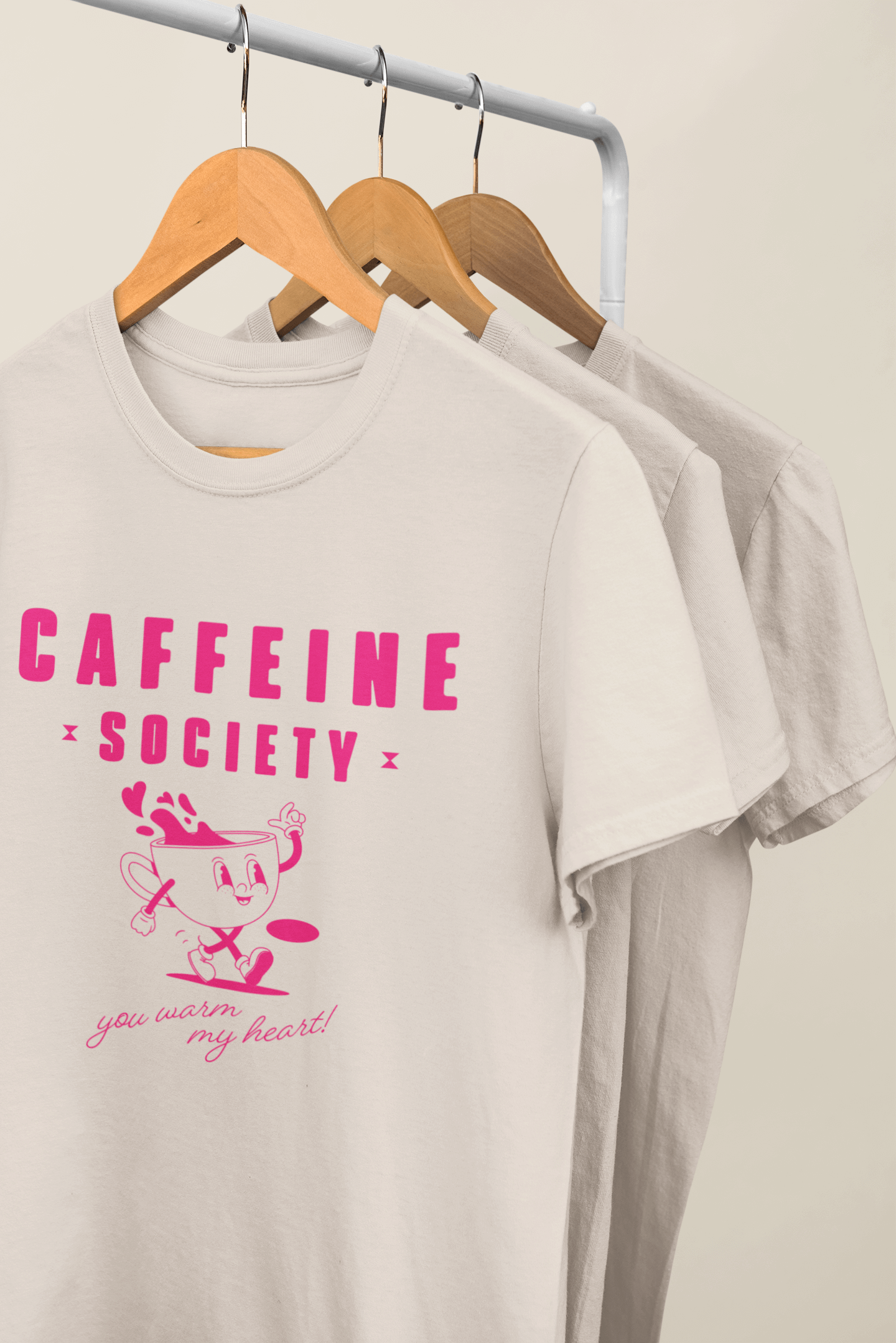 mockup-of-a-series-of-t-shirts-hanging-from-a-rack-34002 (3).png