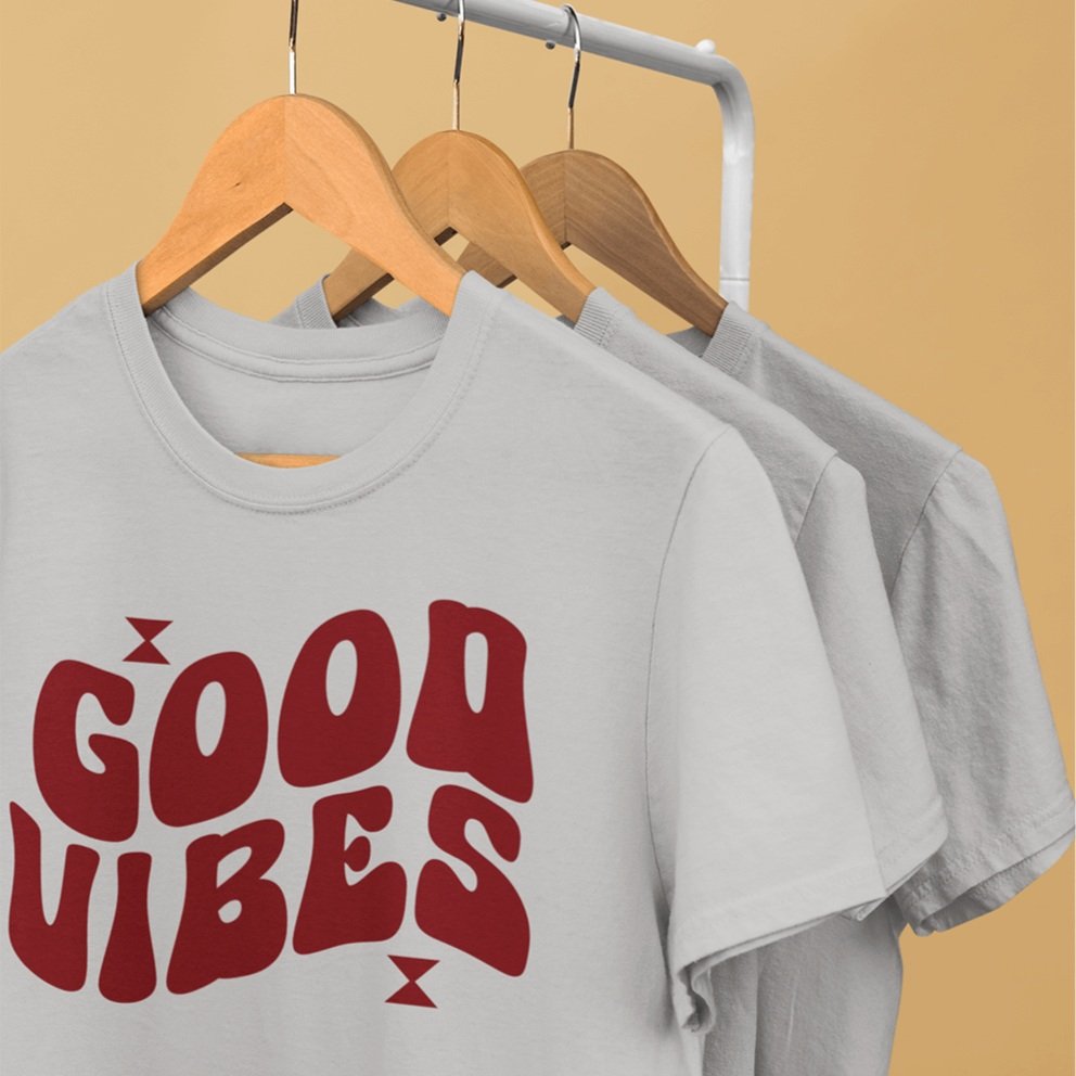 mockup-of-a-series-of-t-shirts-hanging-from-a-rack-34002+%281%29.jpg