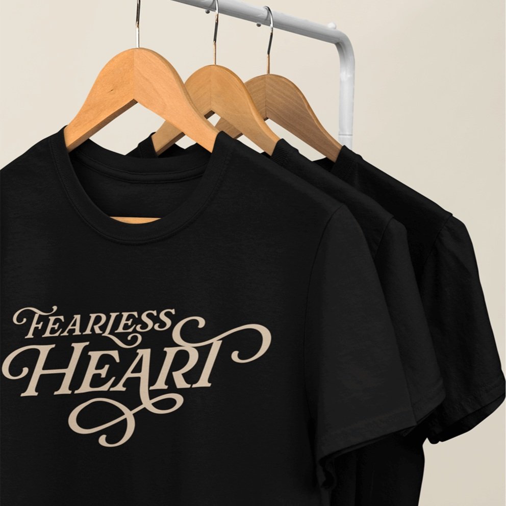 mockup-of-a-series-of-t-shirts-hanging-from-a-rack-34002+%289%29.jpg