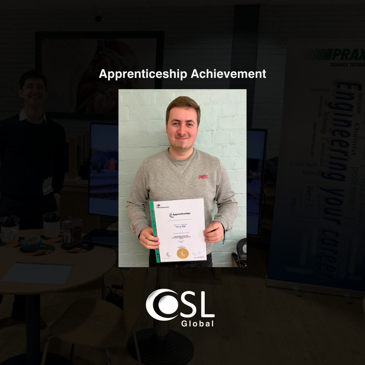 Harry holding a Level 3 Engineering Technician Apprenticeship Certificate