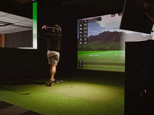 Golf simulator bay at Pro Racing Hastings