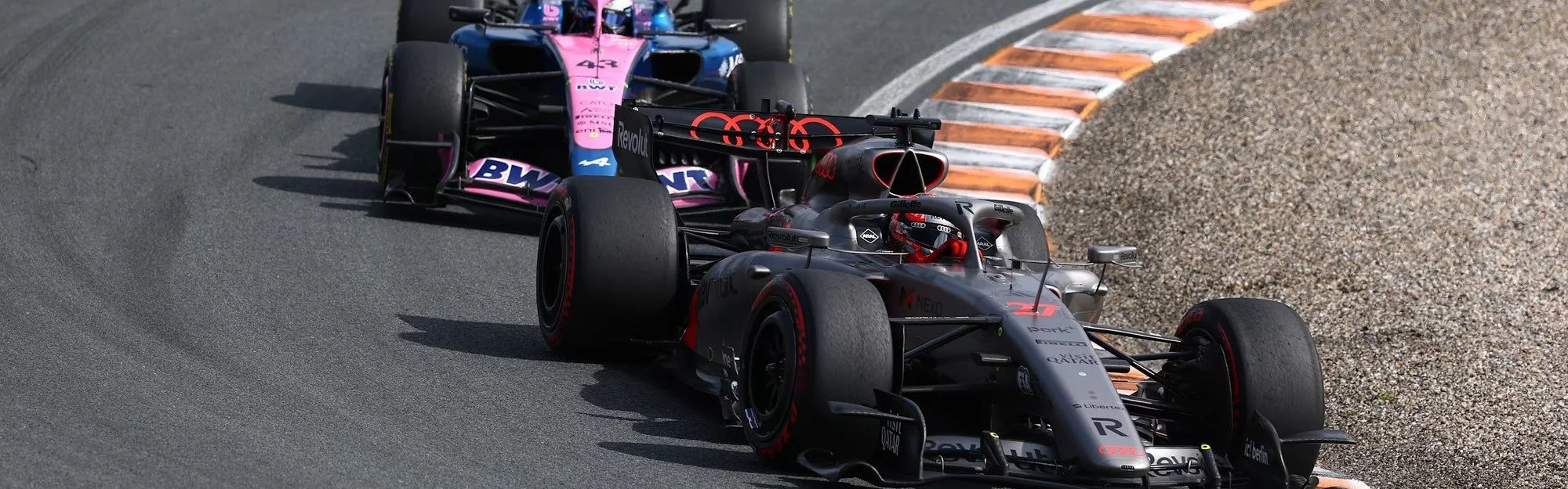 2026-spec Formula 1 cars racing wheel to wheel - F1 Race Night Circuit of the Americas at Pro Racing Hastings