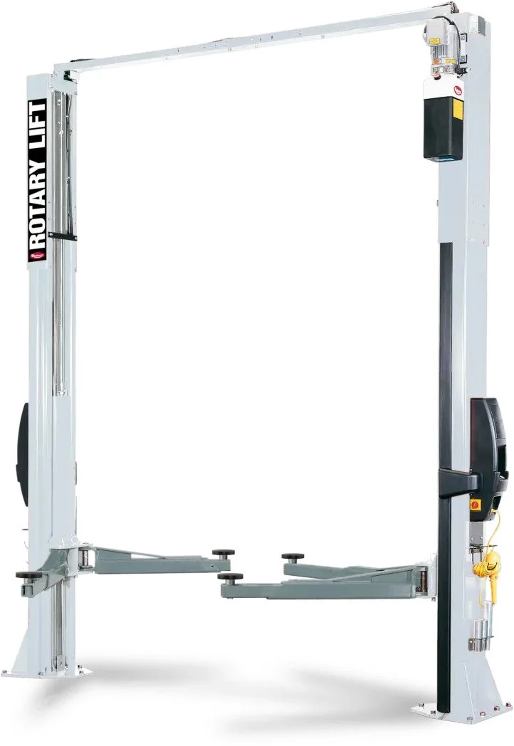 Une structure de levage rotatif industriel en métal avec un moteur électrique, sans charge ou objets attachés.