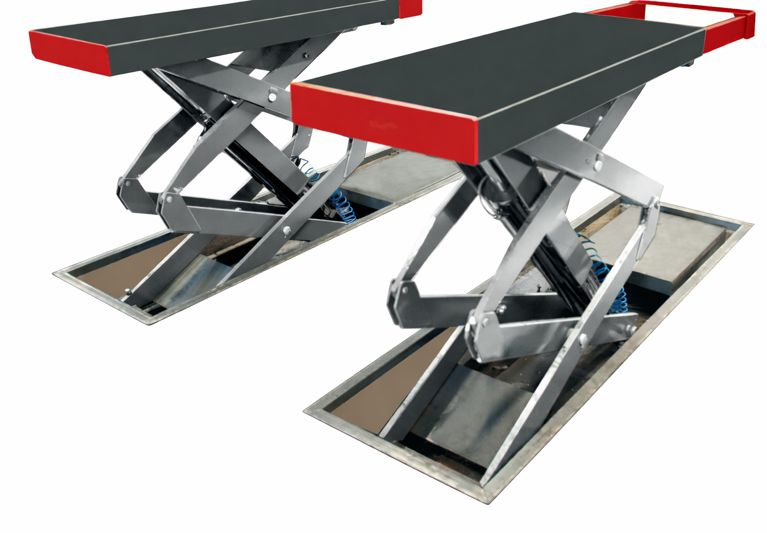 Deux plates-formes élévatrices pour véhicules, équipées de surfaces de conduite noires avec des borders rouges.