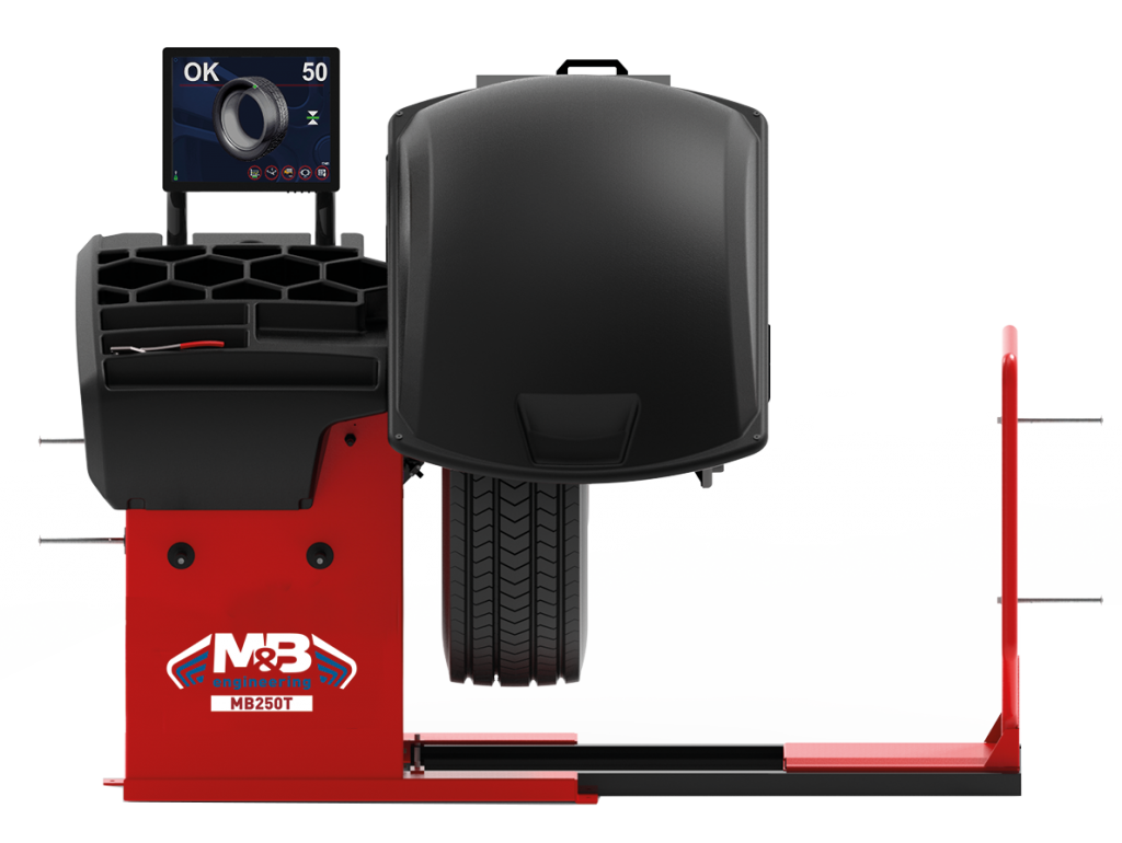 Un équipement de diagnostic pour véhicules, comprenant une roue, un écran d'affichage, un boîtier de test, et une plateforme de support, avec un logo de M&B Engineering sur la base rouge.