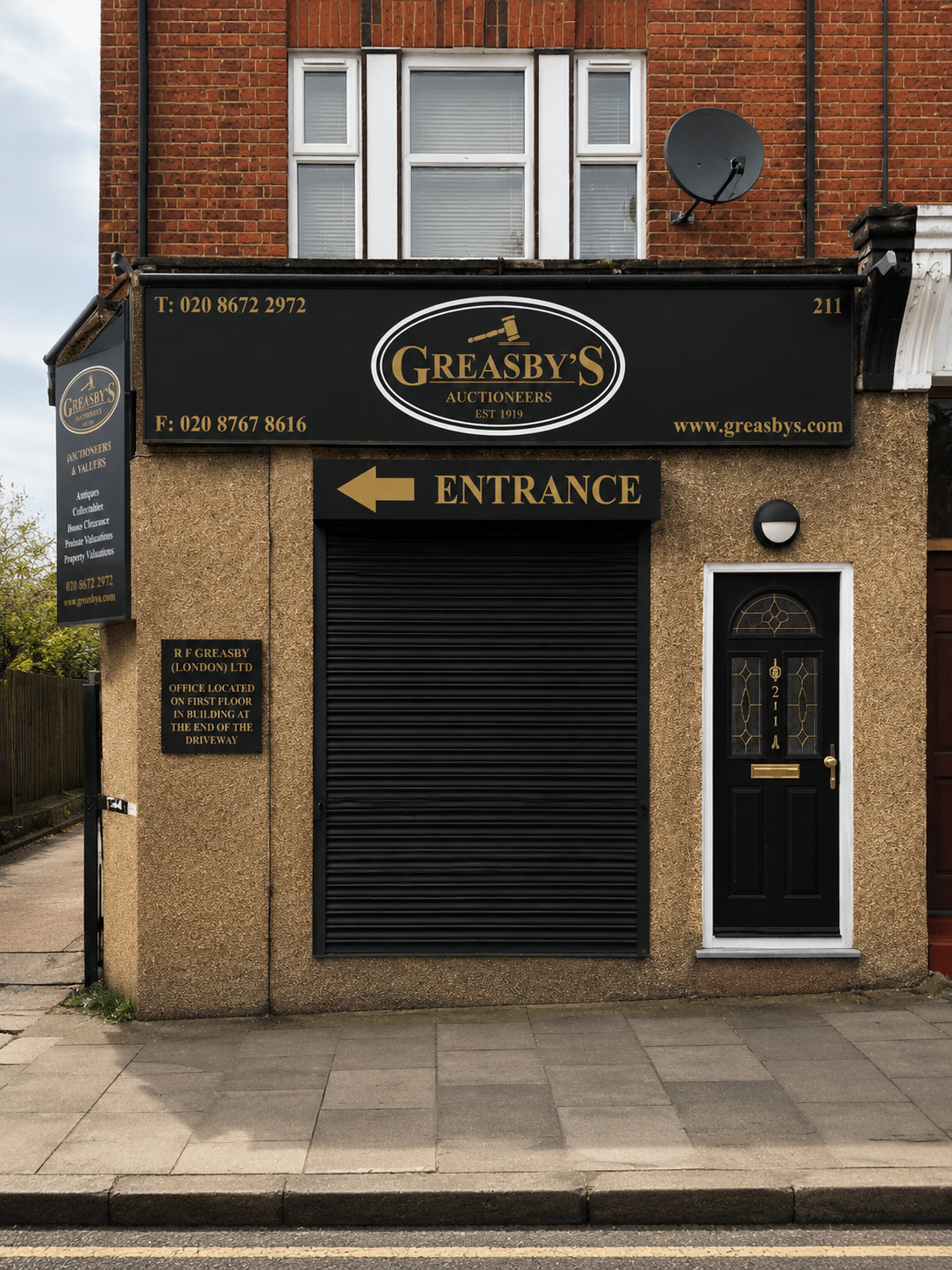 Greasby’s Auctioneers entrance and storefront in London