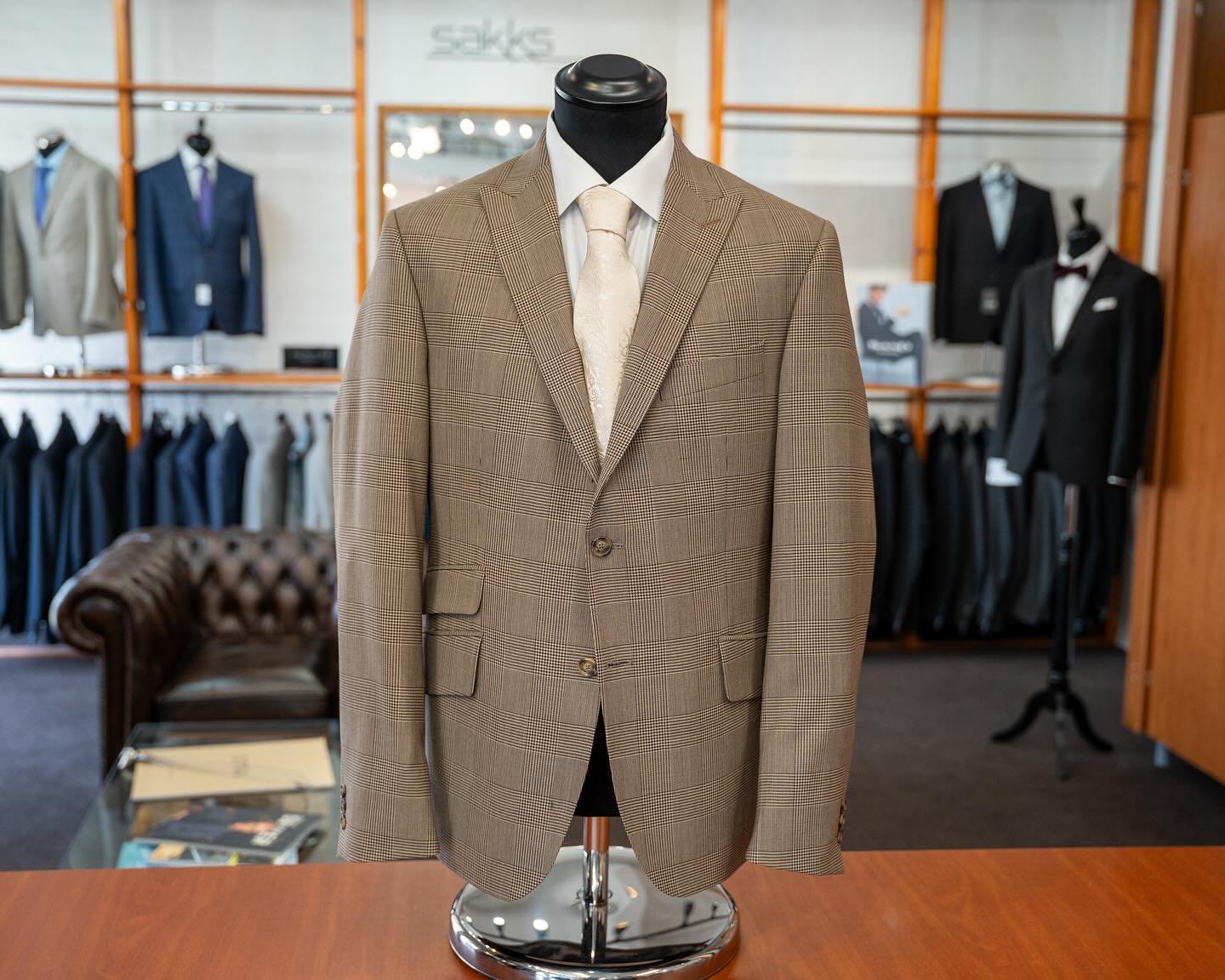 Crafted for summer sophistication, this made-to-measure suit from the Dugdale Bros &amp; Co. Tropical Breeze: Cool Twist collection is the perfect blend of comfort and performance. At just 290gms, the cloth is lightweight, breathable, and tailored to