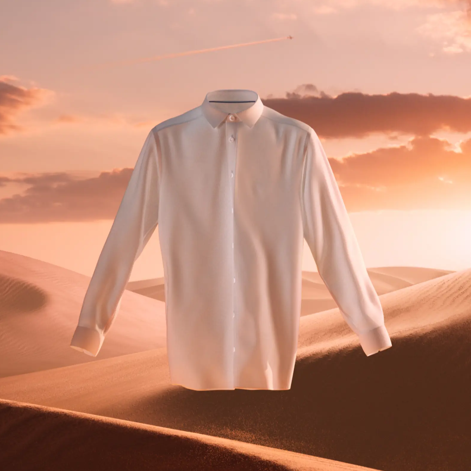White button-up shirt floating in a desert landscape at sunset with clouds in the sky.