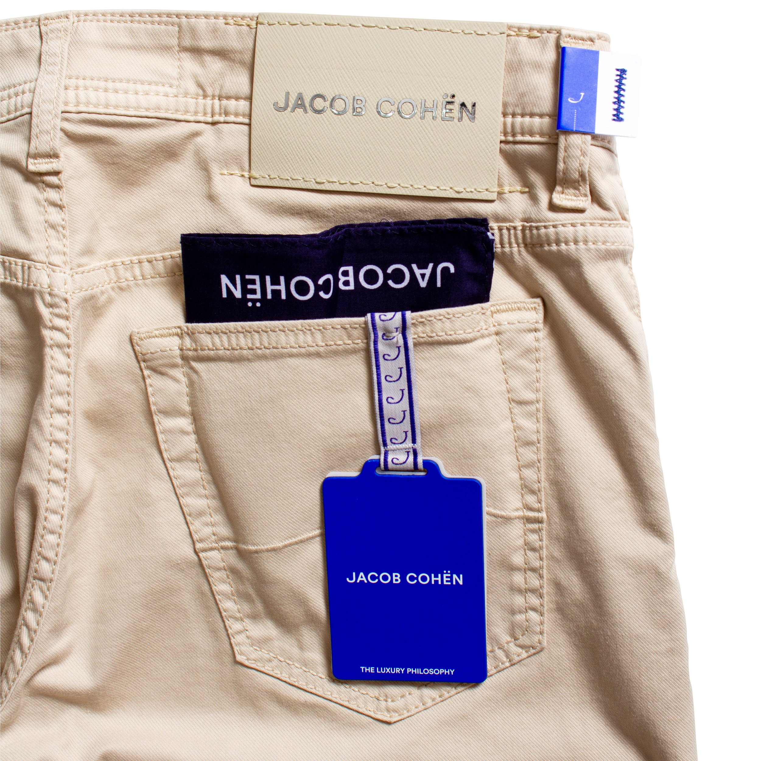Close up image of Jacob Cohen beige chinos badge.
