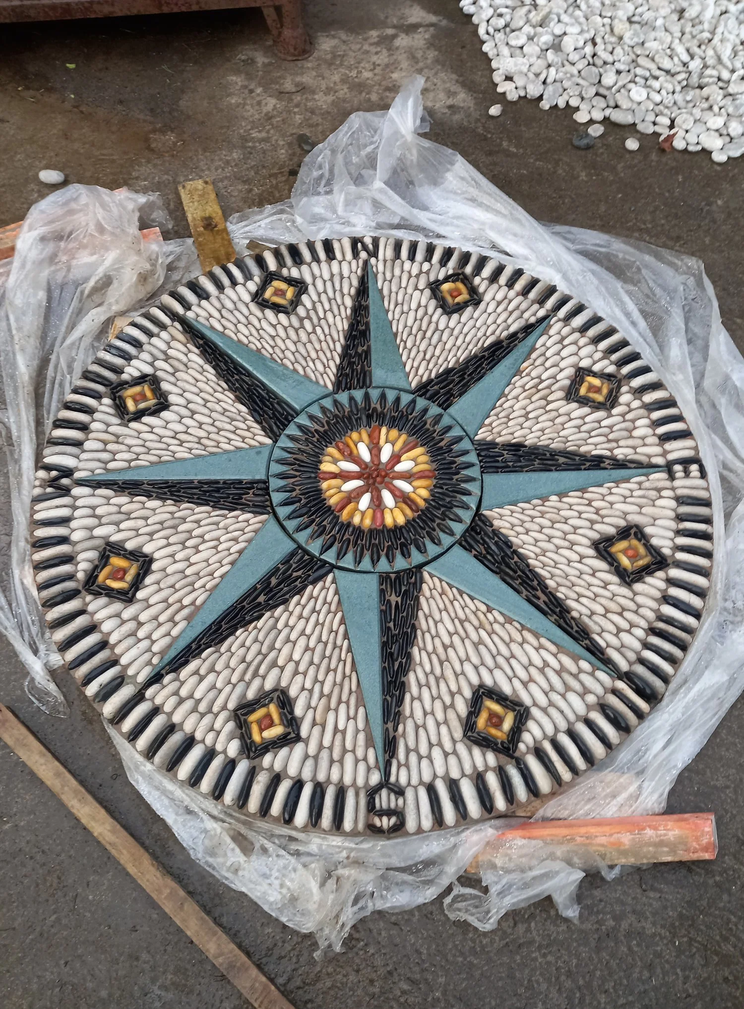 Round mosaic tabletop with star design