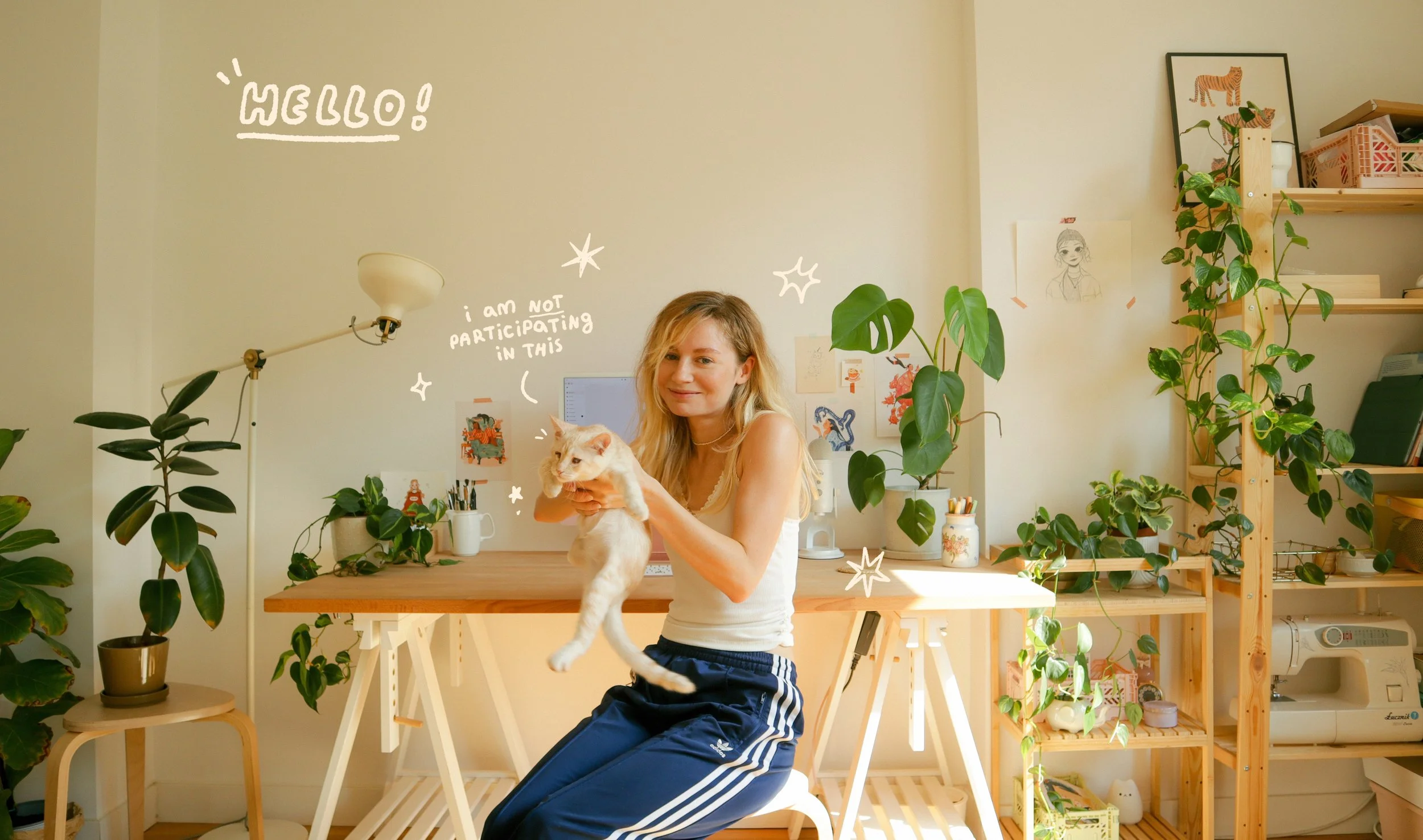 Woman holding a cat in a room with plants, desk, and shelves, with playful handwritten notes and drawings overlayed, including 'HELLO!', 'I am not participating in this', and sparkles.