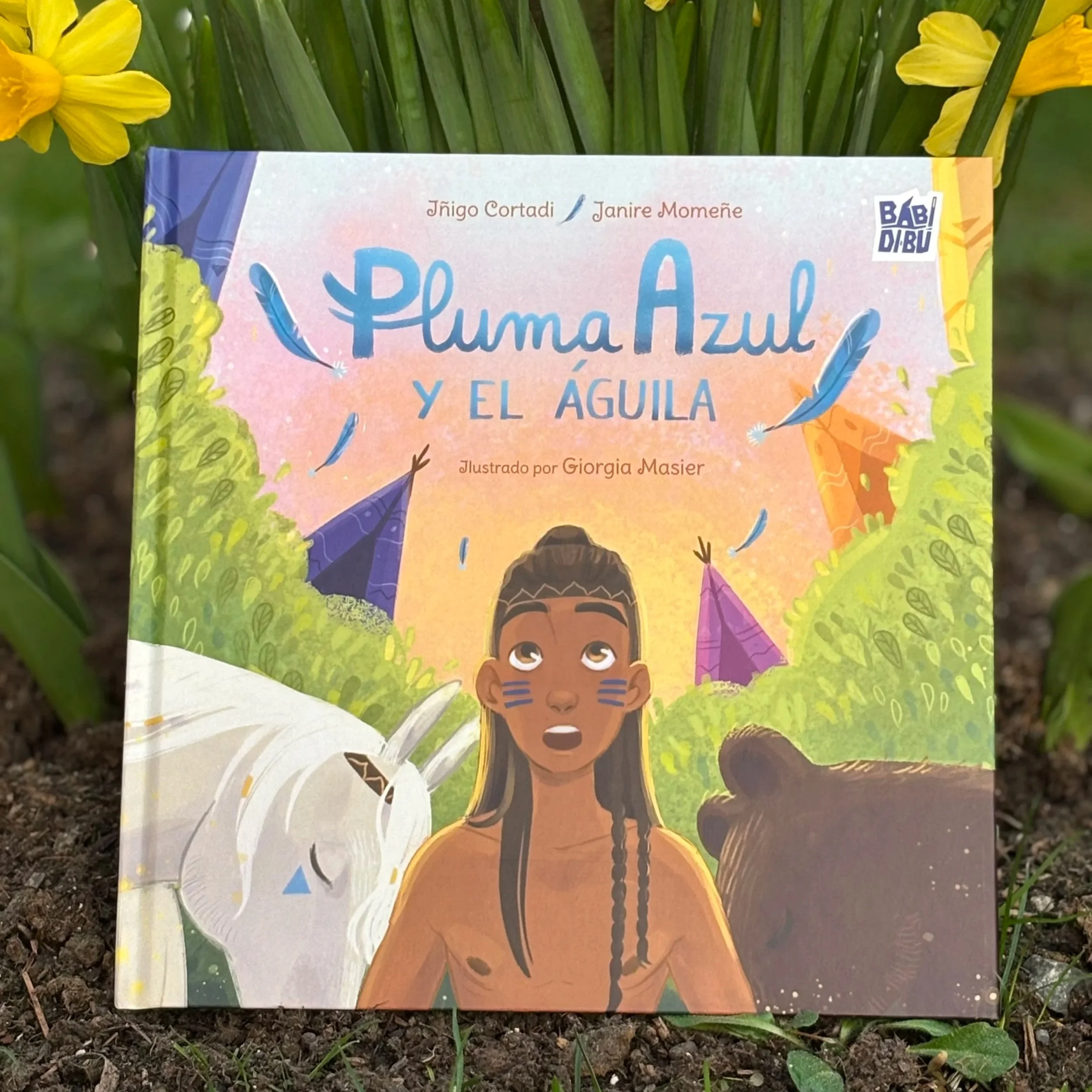 Copertina di "Pluma Azul y el aguila", albo illustrato per bambini