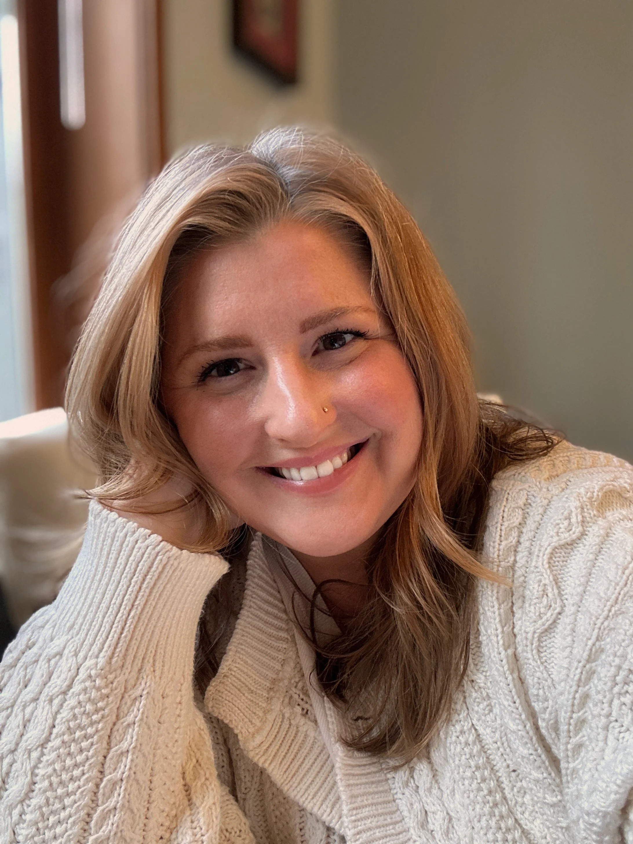 Therapist Elizabeth Bryant sitting in counseling office in Bellevue