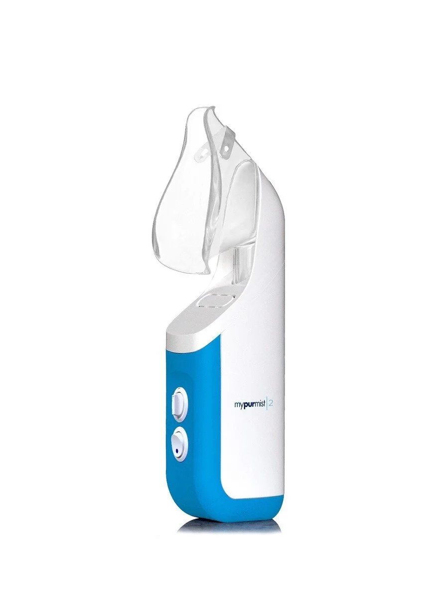 A handheld nebulizer with blue and white body, featuring two control dials and a clear mask attached to the top, used for inhalation therapy.