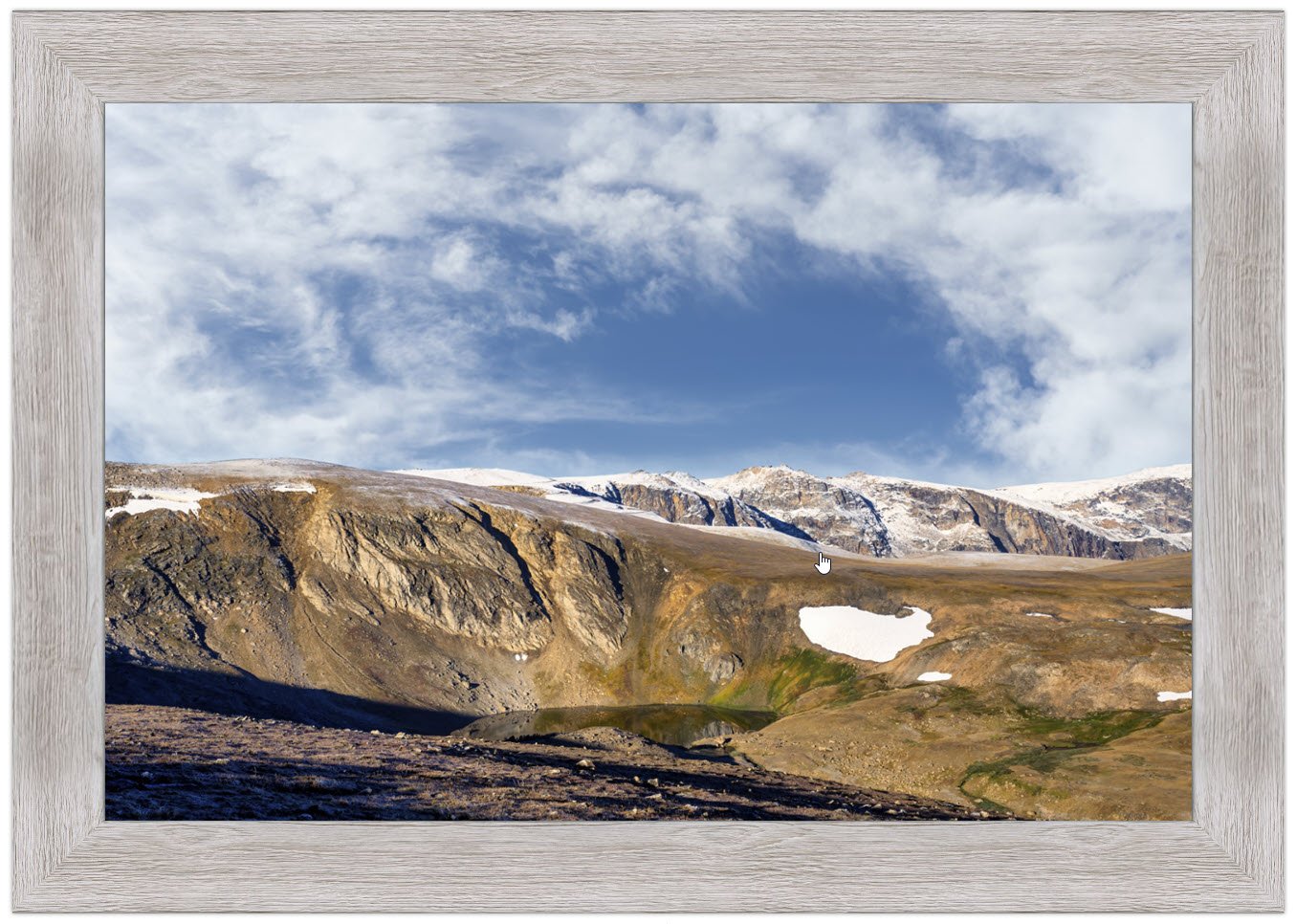 Gorgeous mountain scene with beautiful sky shown in a custom wood frame