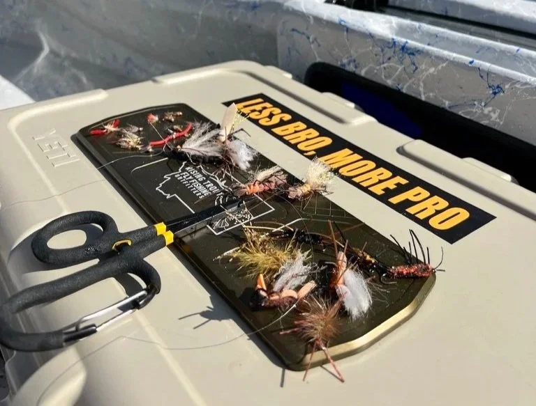 Fly Fishing Boat bag with a boat patch and flies on it