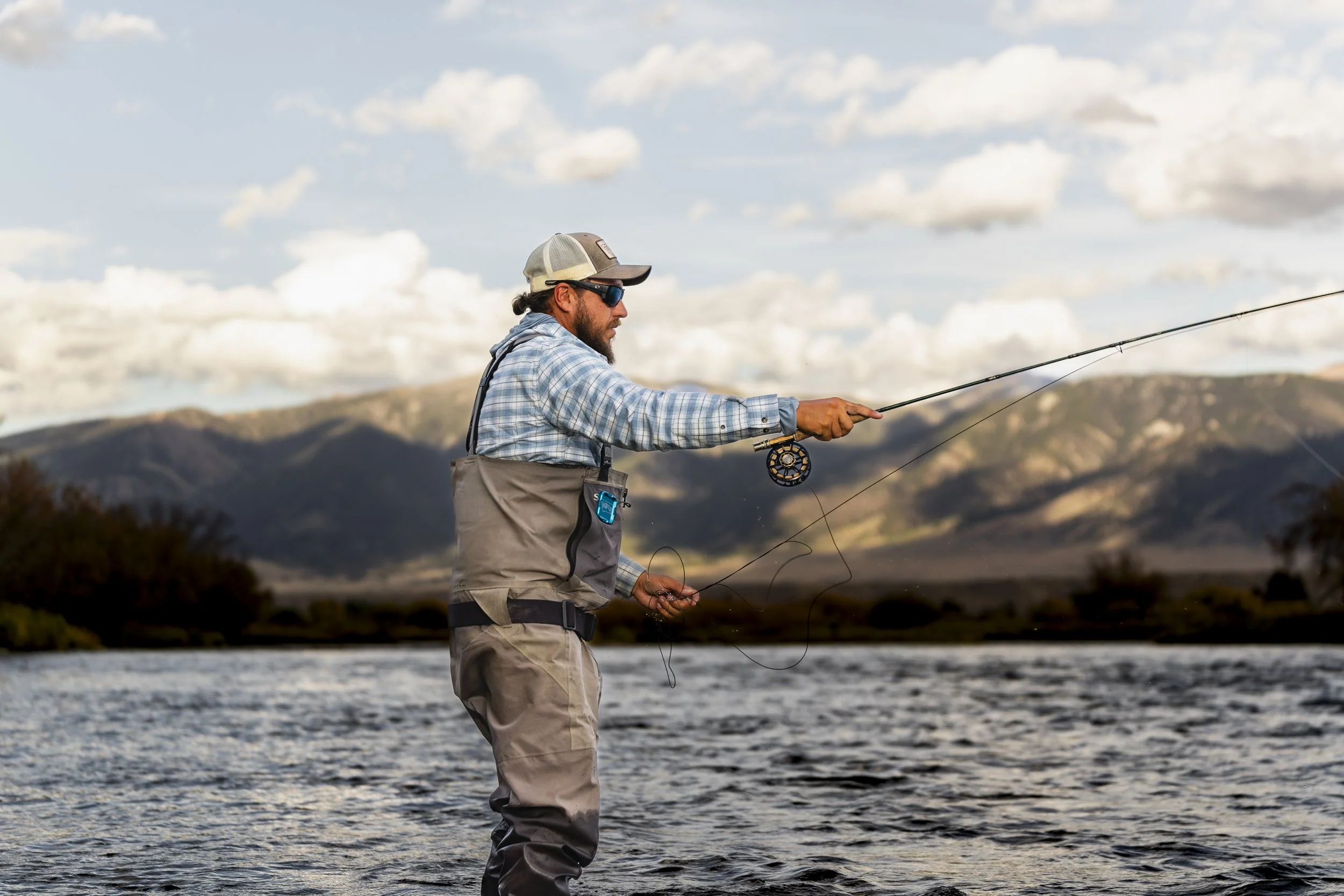 Walk Wade fly angler casting a rod on the Madison River