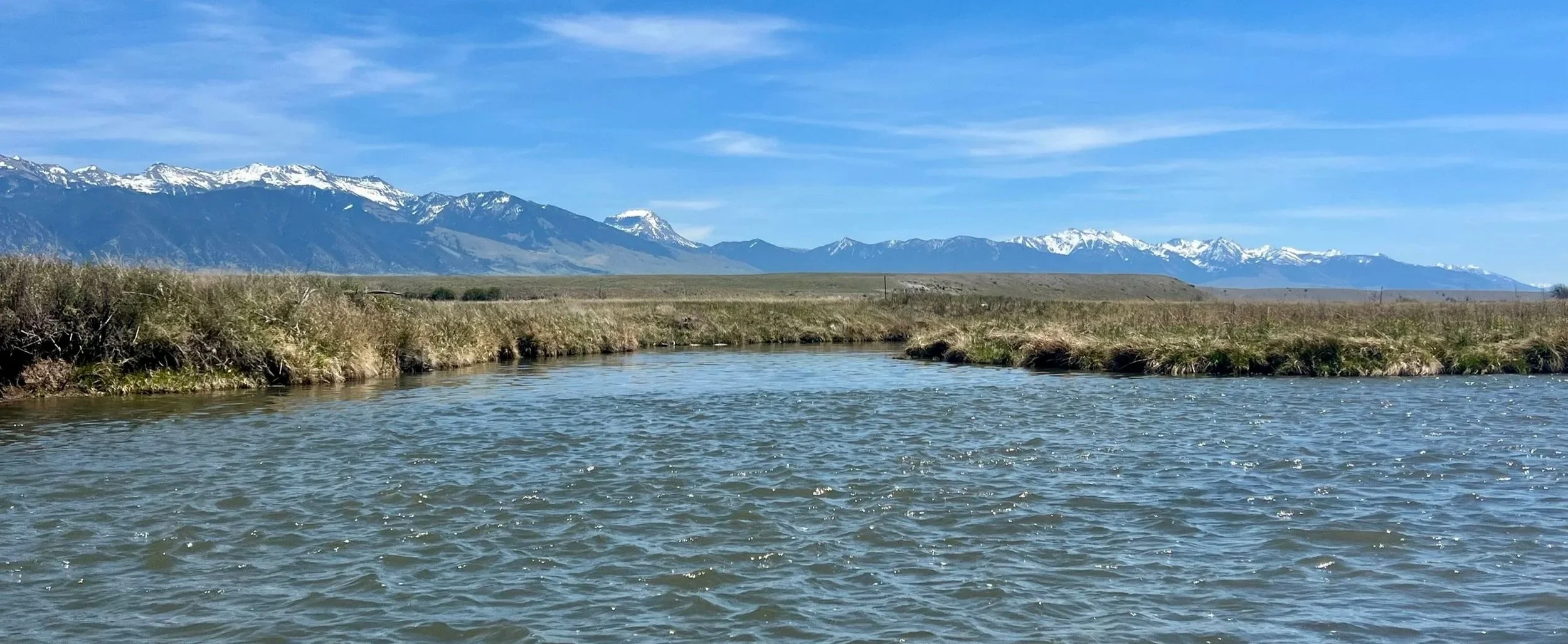 A view of the Madison River in Montana on a guided fly fishing trip