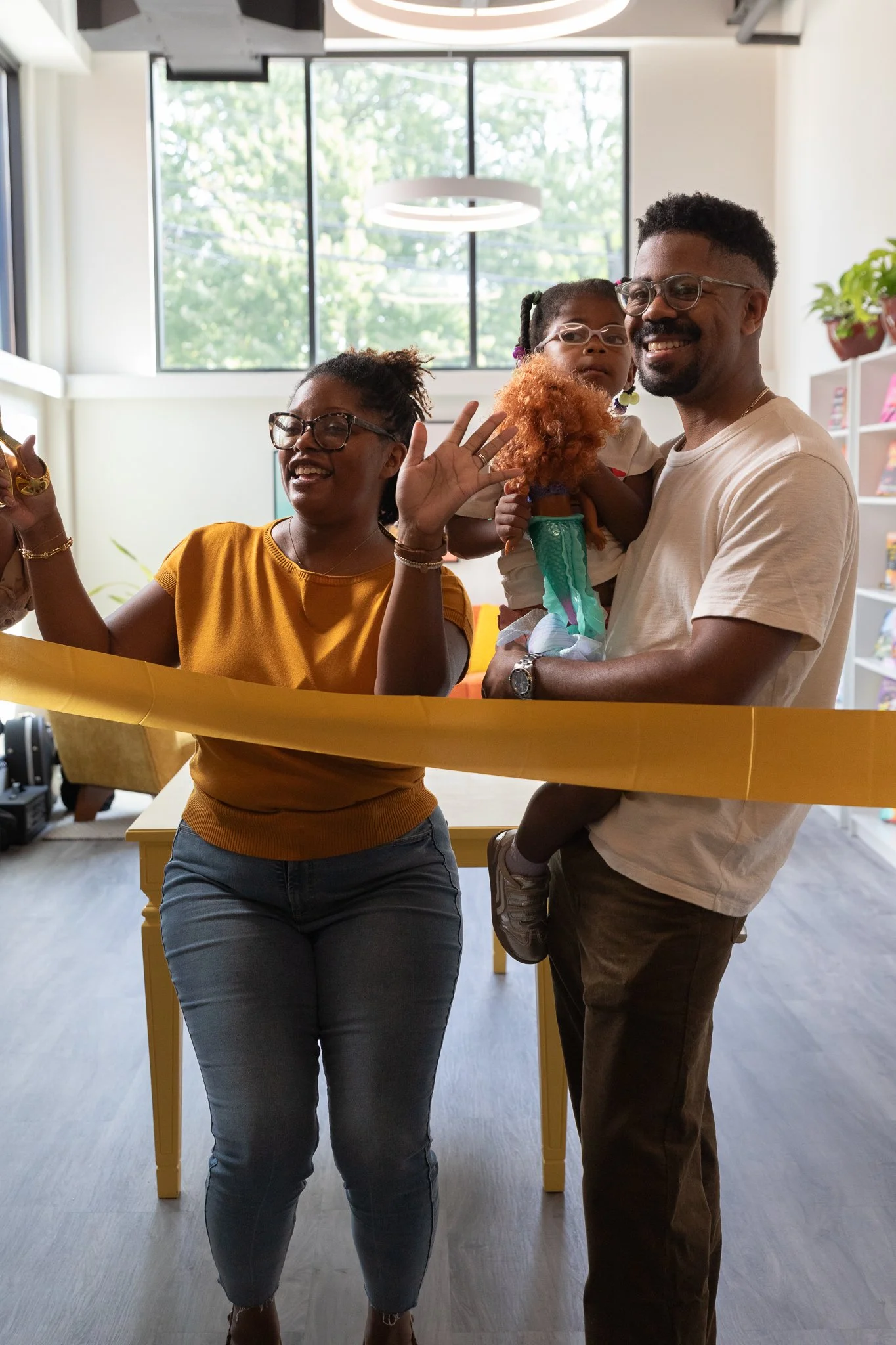 Picture of L'Oreal Thompson Payton and her family at the grand opening of Zora's Place.