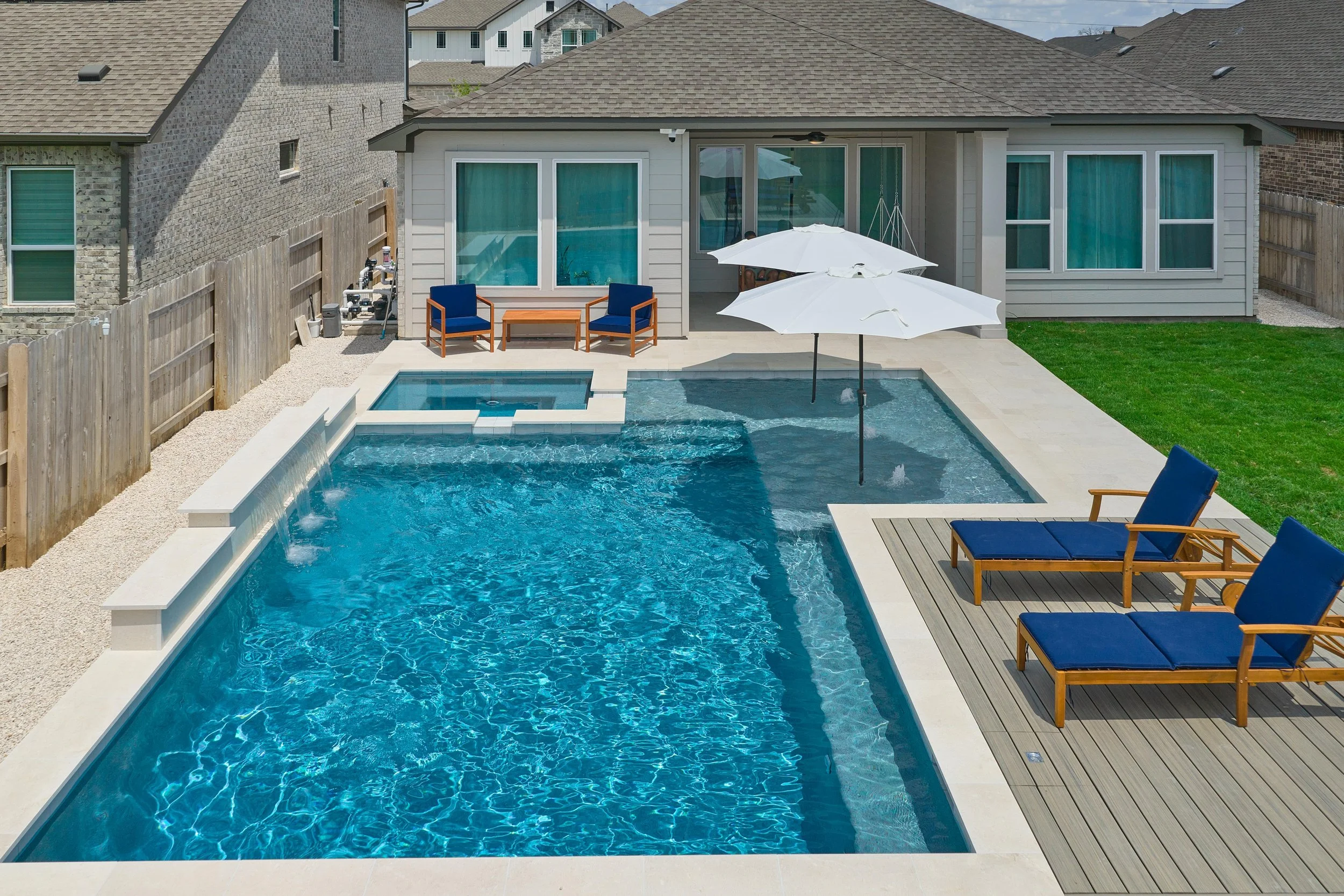 Luxury pool and outdoor living project by Aqua Logistics Custom Pools in Central Texas
