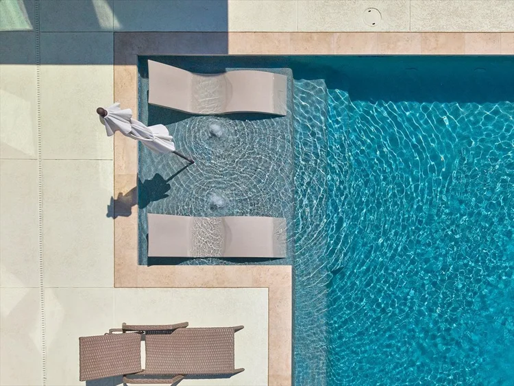 Pool deck and outdoor seating — Bastrop custom pool
