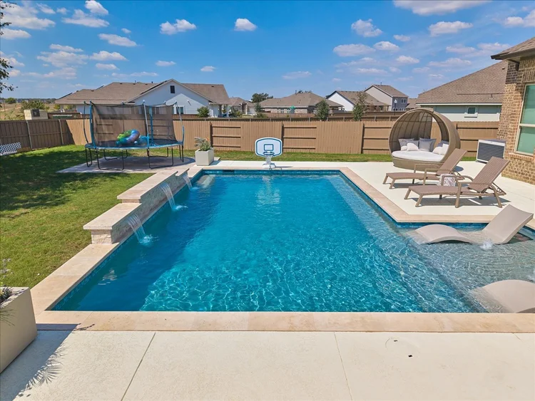 Turquoise tile waterline detail — Hetricks Bastrop pool