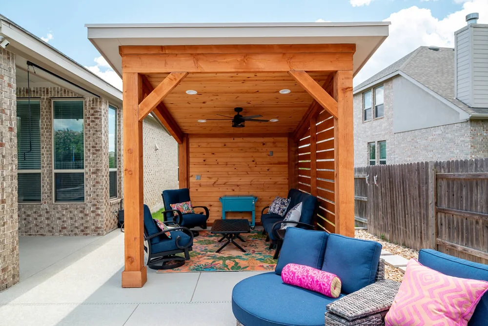 Backyard pergola with outdoor seating — Austin TX