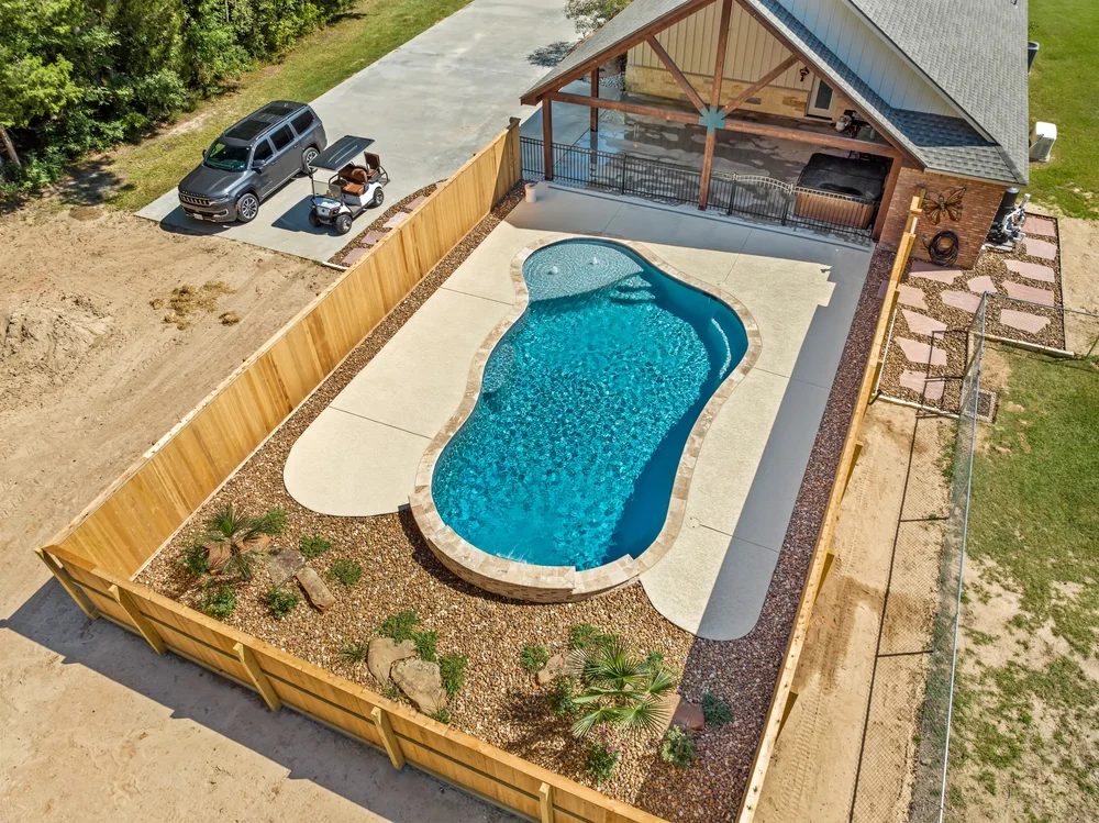 Kidney pool with stone border — Austin TX