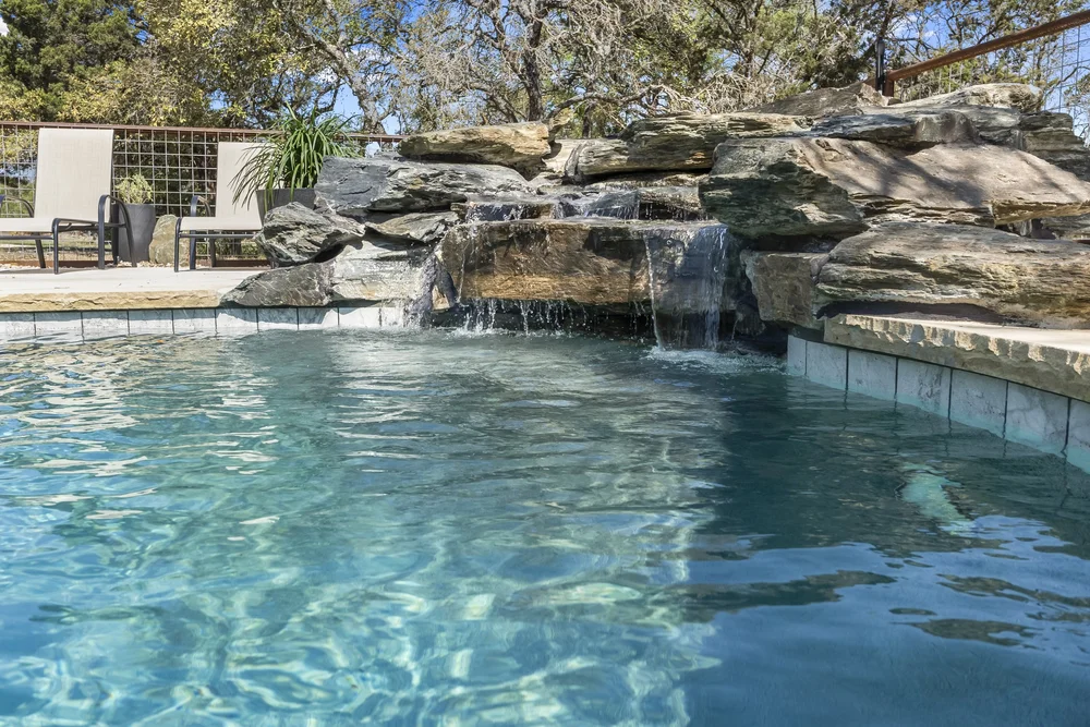 Pool with waterfall feature — Austin pool builders