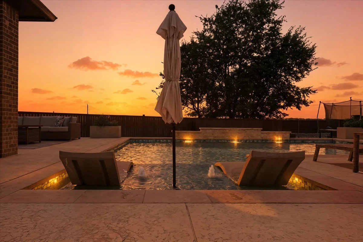 new pool with sunset from aqua logistics custom pools