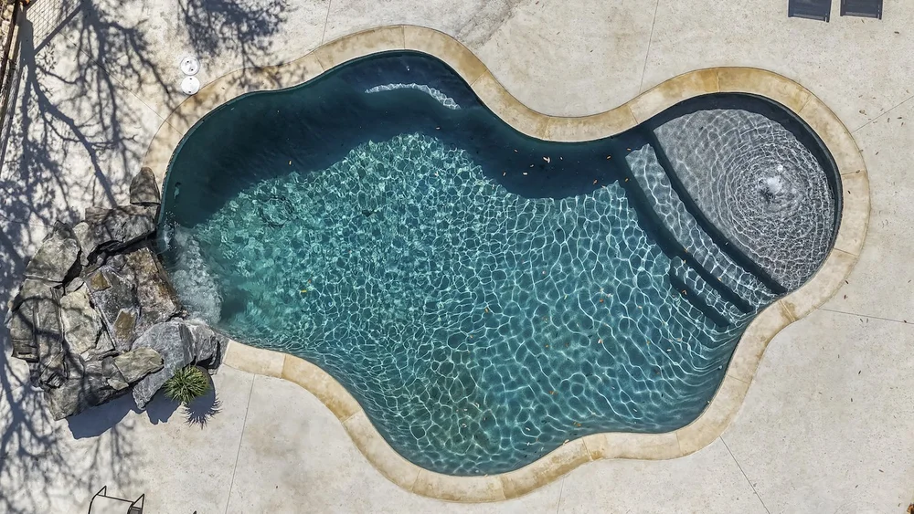 Deep Ocean Boulder waterfall detail — Spivey Leander pool