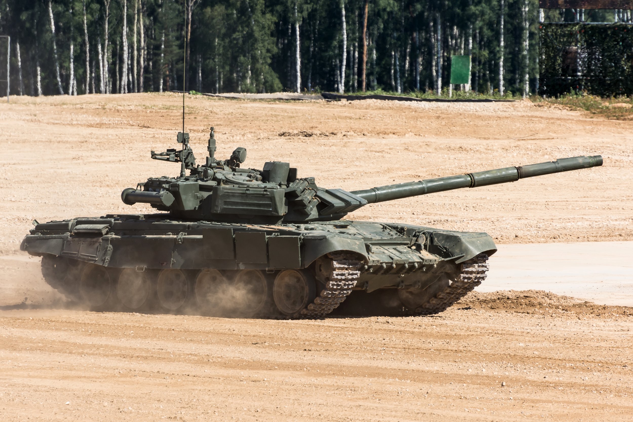 military-army-tank-ready-attack-moving-deserted-battle-field-terrain.jpg