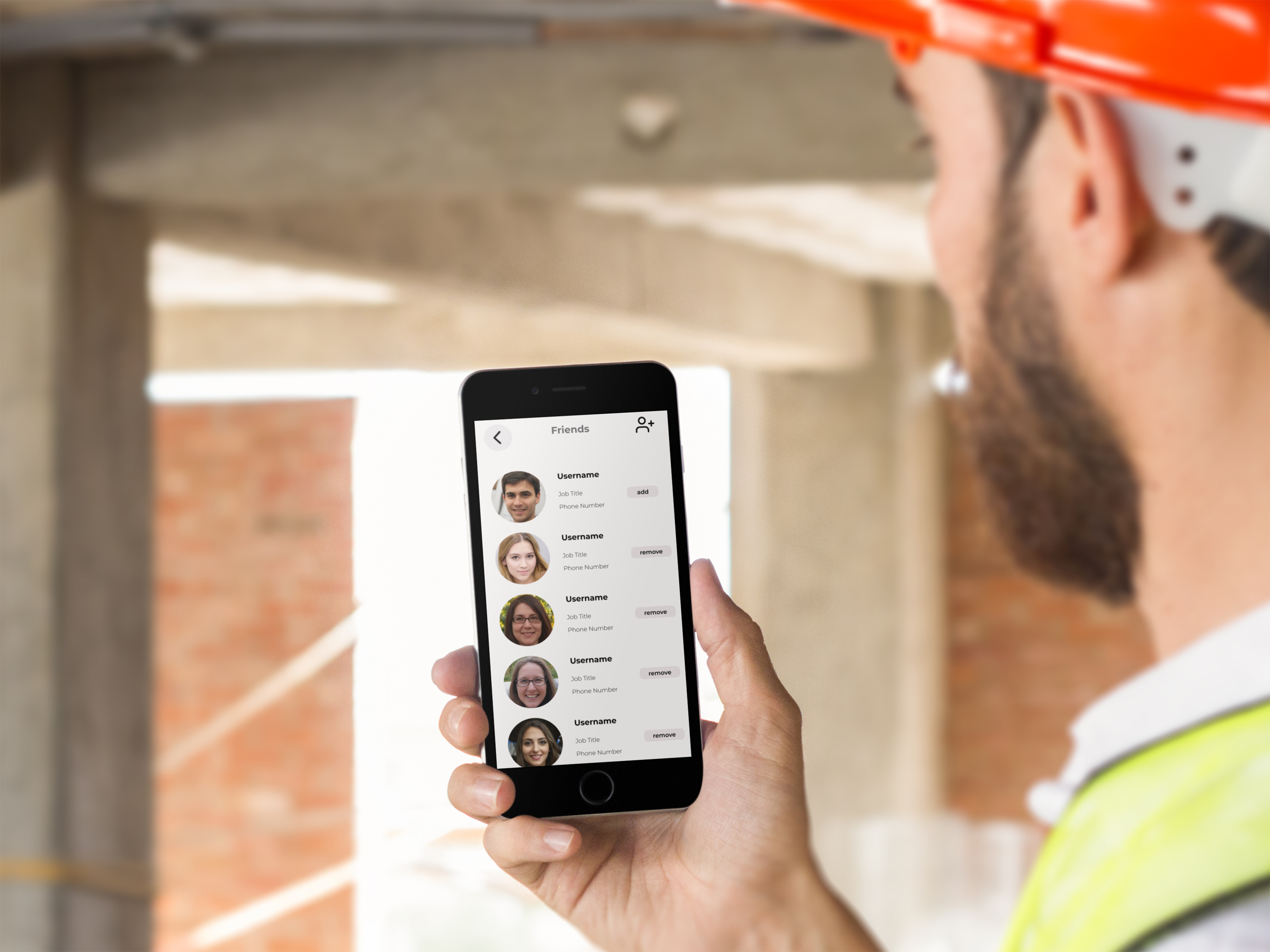 mockup-of-a-man-checking-his-iphone-in-portrait-mode-in-a-construction-zone-12423.png