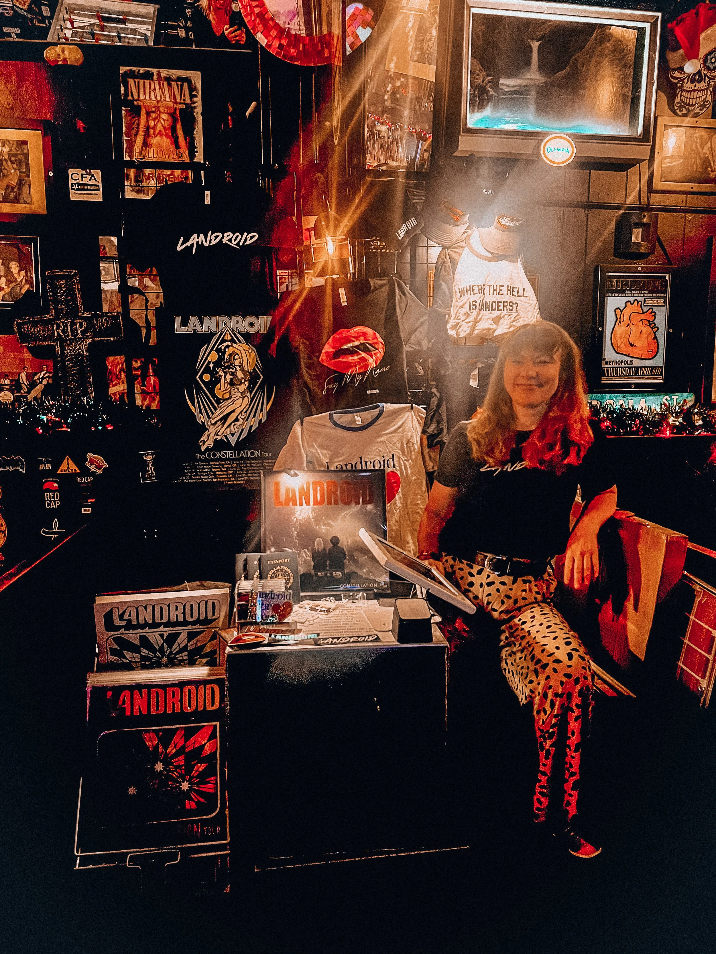 Our incredible merch person, Charlotte Burns. Photo by Cooper Gillespie.
