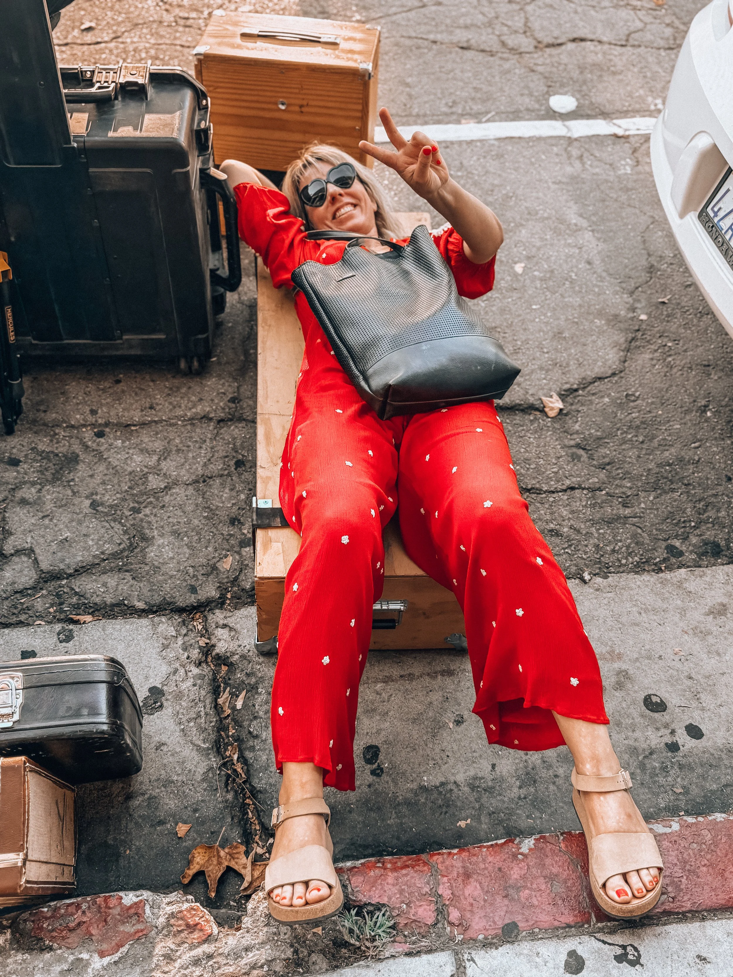 Cooper taking a break during load in at The Redwood Bar in LA. Phot by Charlotte Burns.
