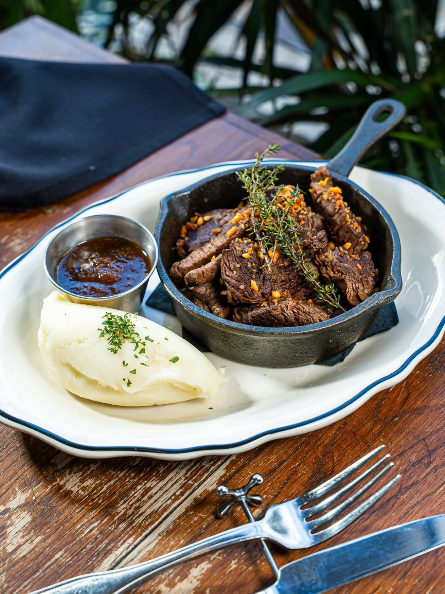 Steak for Happy Hour? Don&rsquo;t mind if we do!

Our "Butcher&rsquo;s Cut Steak" brings together premium beef trimmings in one seriously flavorful plate, served with your choice of salad, rice, or mashed potatoes.  Great flavor, and even b