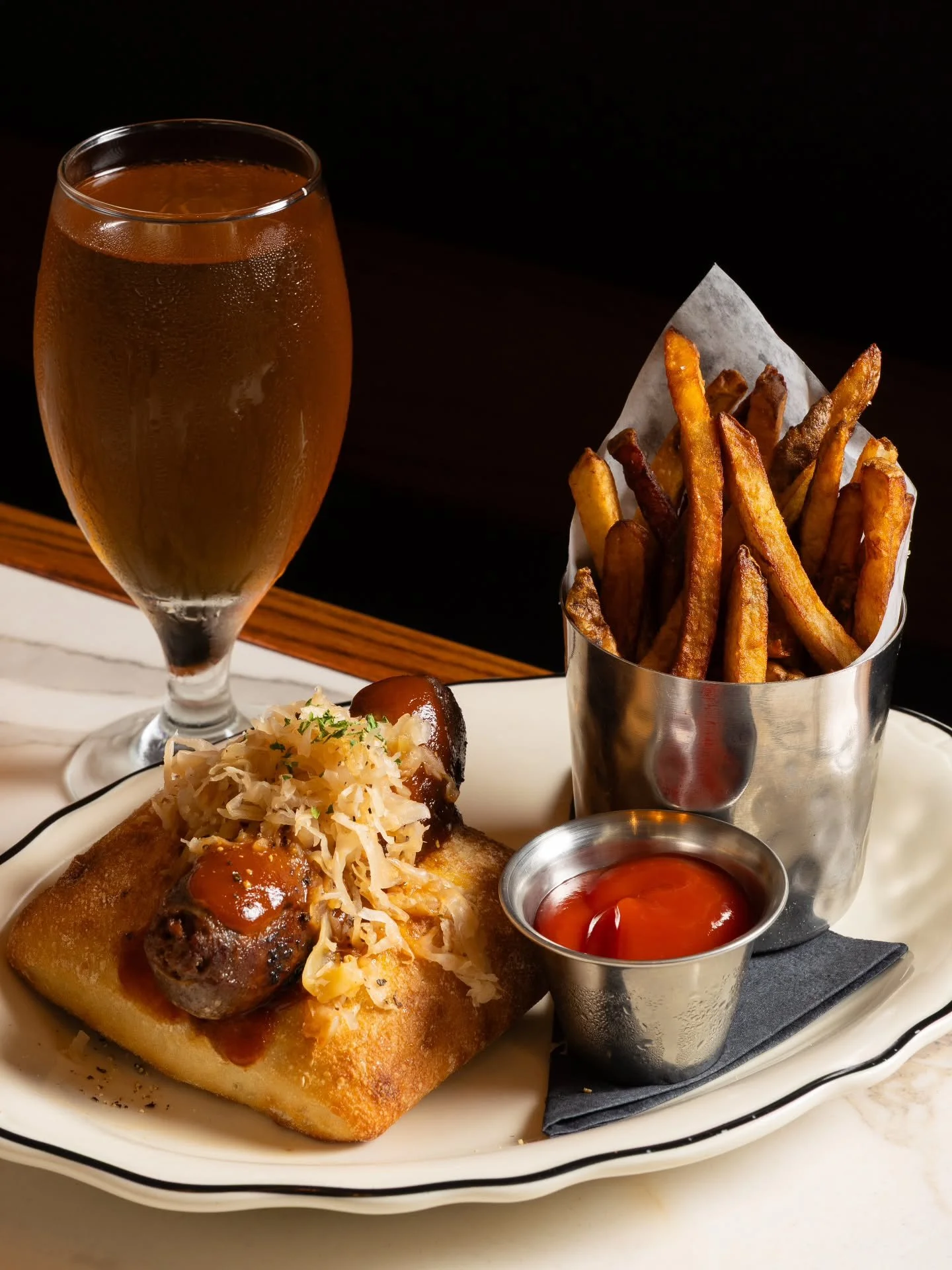 A toasted bun loaded with your choice of sausage, rich, juicy, and full of flavor, served with crispy house-cut fries and a sauce crafted to bring it all together.

We'll see you soon.

#thebutcherbar #premiumsausage #sausagesandwich #waikikibars #ze