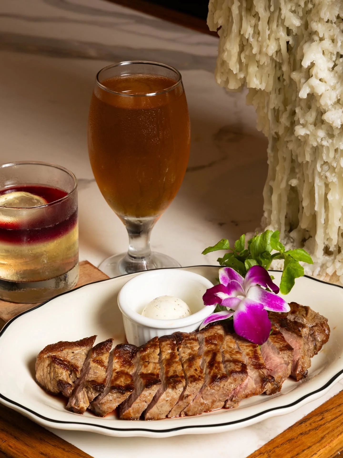 From the first sear to the final bite, our steaks are prepared with intention and served without distraction. Pair yours with a good pour, take your time, and make an evening of it at The Butcher Bar.