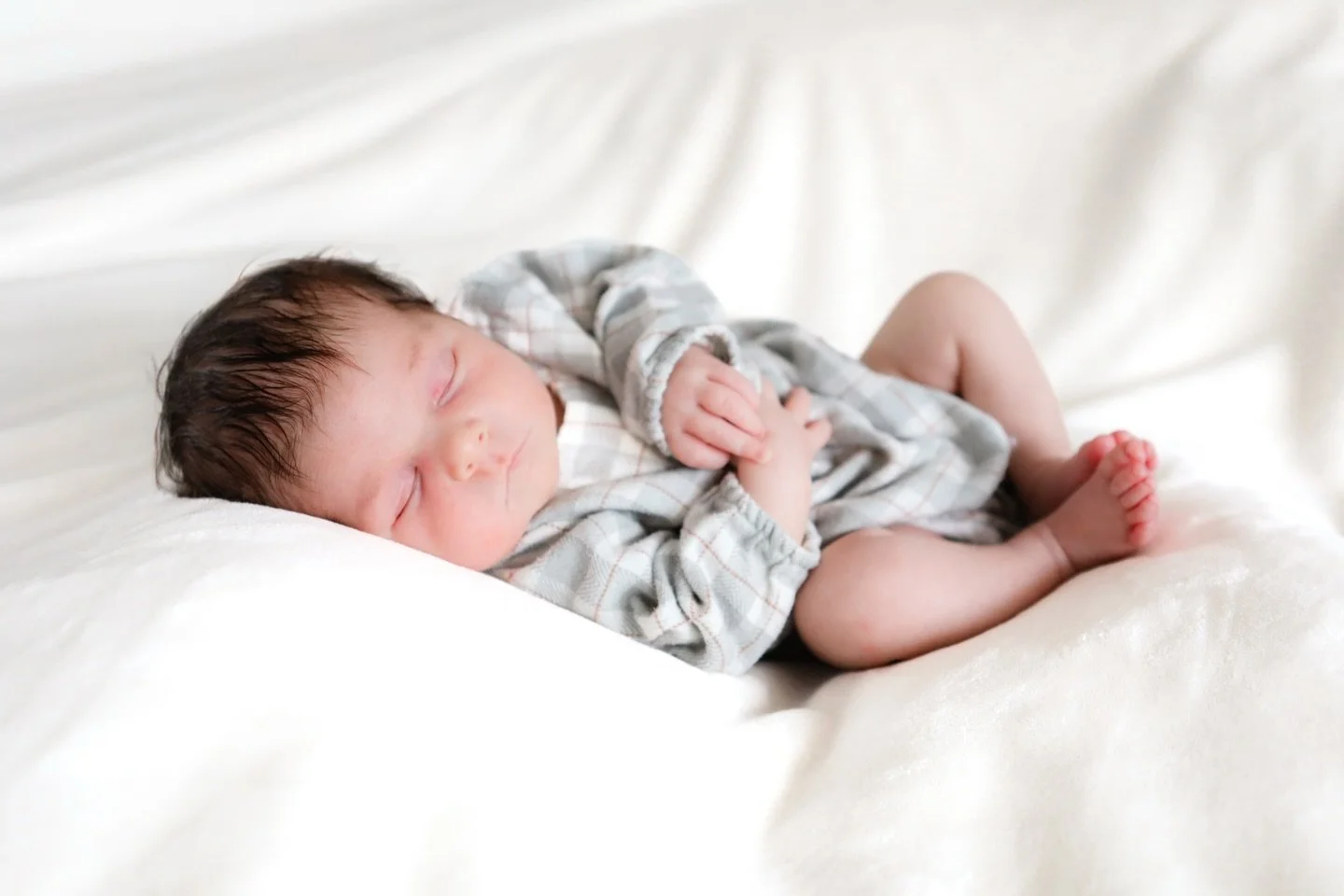 She came in quietly, fists curled, already holding something sacred.

Cecelia Ruth. Named after the women who came before her, which means she arrived already loved by people she&rsquo;ll never meet.

That&rsquo;s the thing about newborn sessions tha