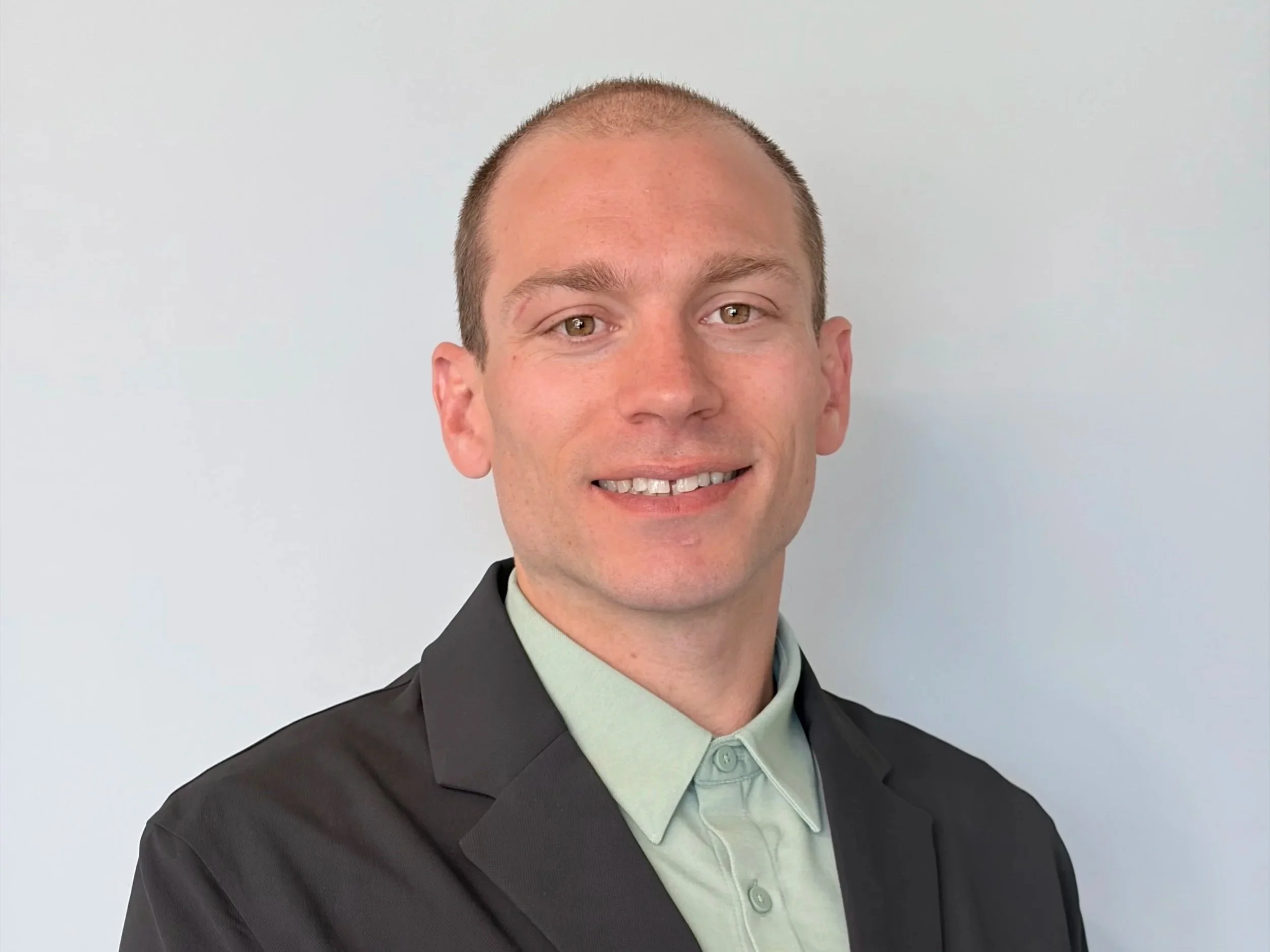 A professional headshot of Lucas Paczek, General Manager at Sea to Sky Energy Solutions.